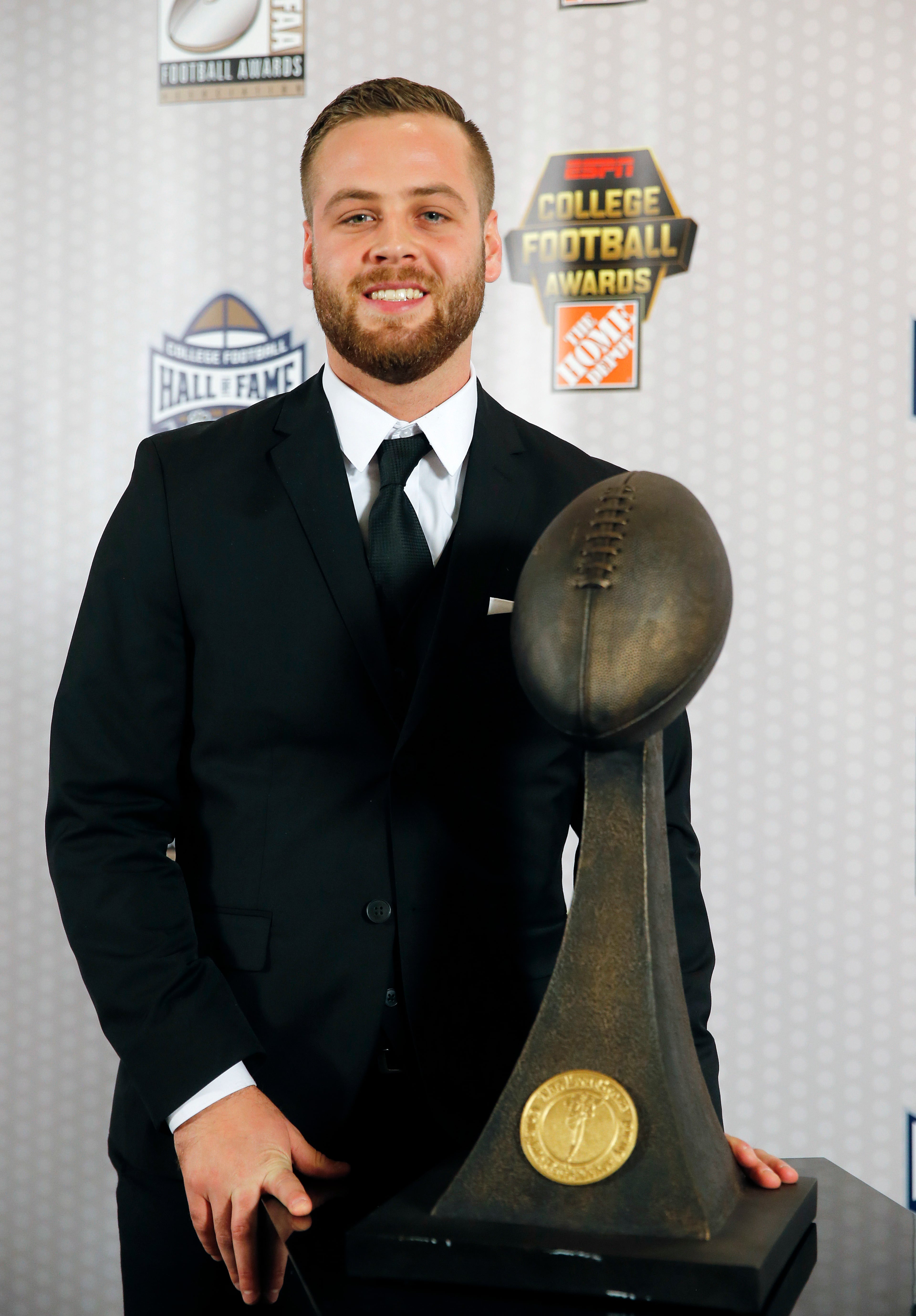 Arizona State place kicker Zane Gonzalez poses with the Lou Groza Collegiate Place-Kicker Award after being named the nation's most outstanding kicker Thursday, Dec. 8, 2016, in Atlanta. (AP Photo/John Bazemore)