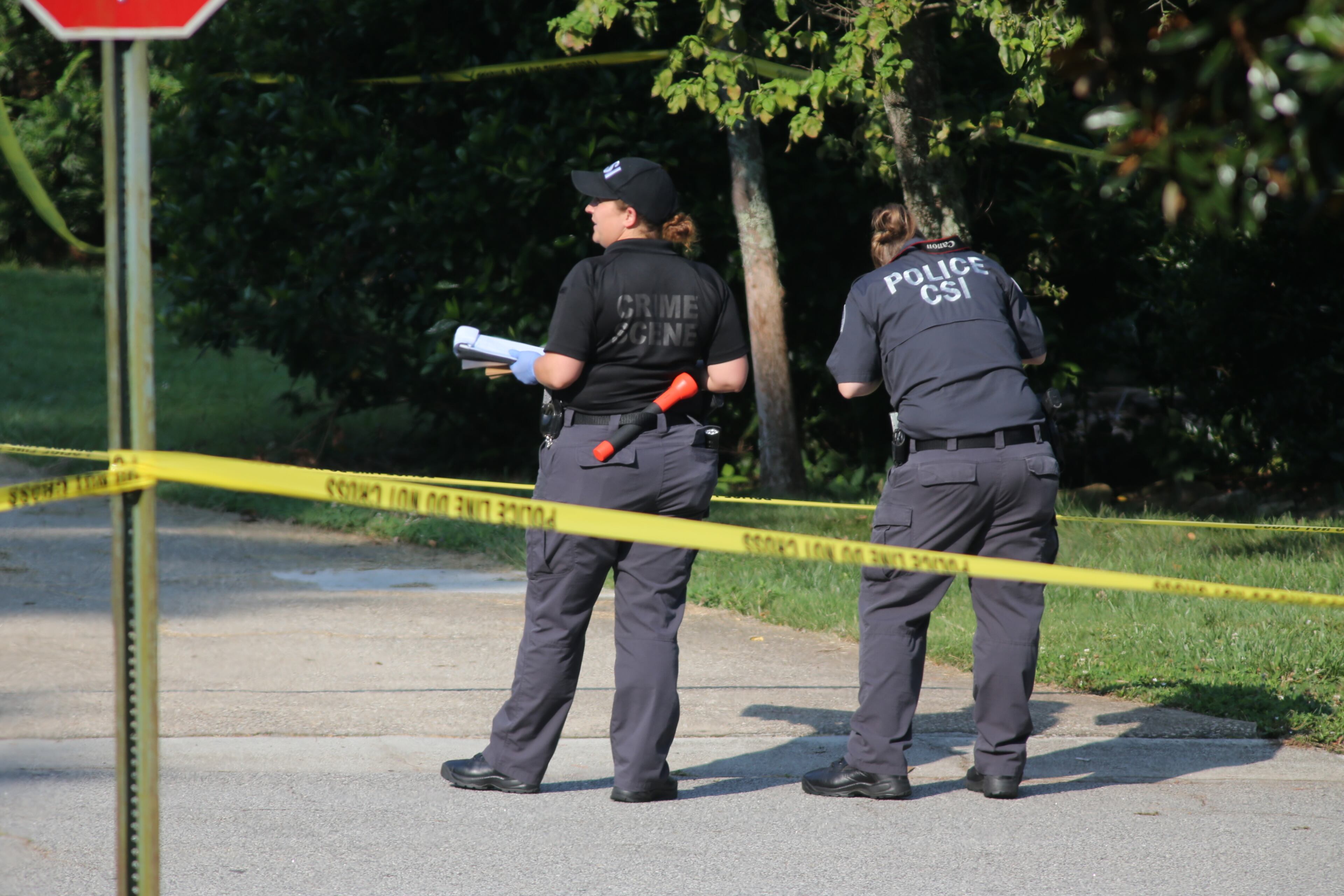Duluth police are on the scene of a deadly home invasion in which a man was killed and a woman and child were shot and wounded. JOHN SPINK/JSPINK@AJC.COM