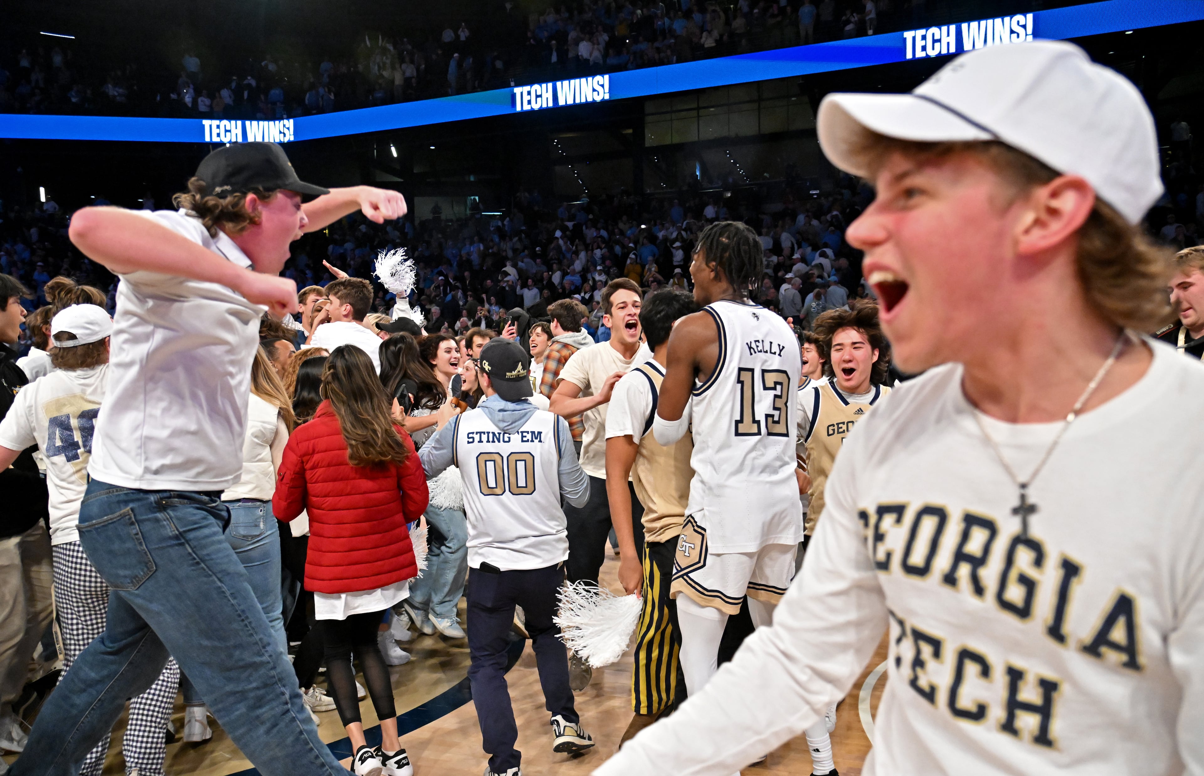 Fans storm the court as Georgia Tech celebrates the victory over North Carolina in an NCAA college basketball game at Georgia Tech’s McCamish Pavilion, Tuesday, January 30, 2024, in Atlanta. Georgia Tech won 74-73 over North Carolina. (Hyosub Shin / Hyosub.Shin@ajc.com)