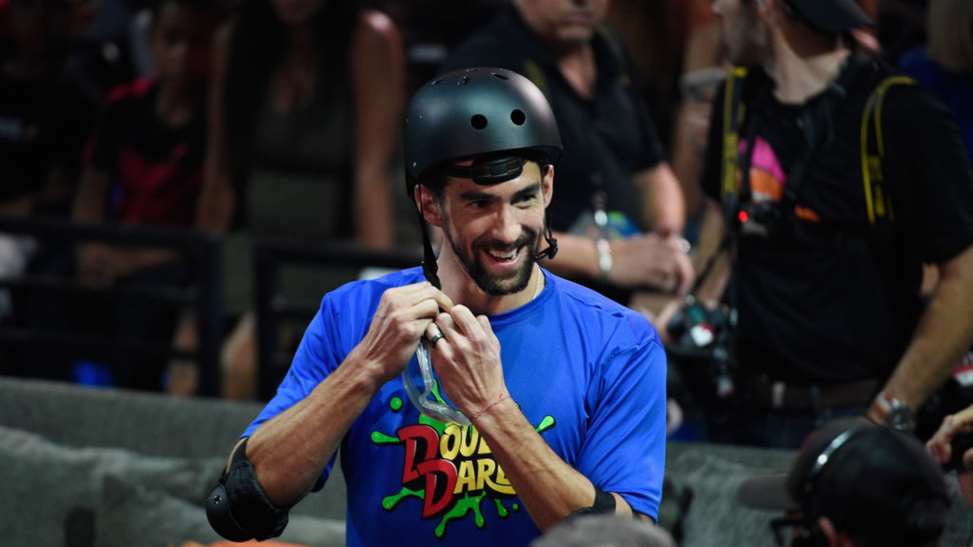 SANTA MONICA, CA - JULY 19: Swimmer Michael Phelps participates in a challenge onstage during the Nickelodeon Kids' Choice Sports 2018 at Barker Hangar on July 19, 2018 in Santa Monica, California. Phelps was diagnosed with ADHD when he was 9 years old.