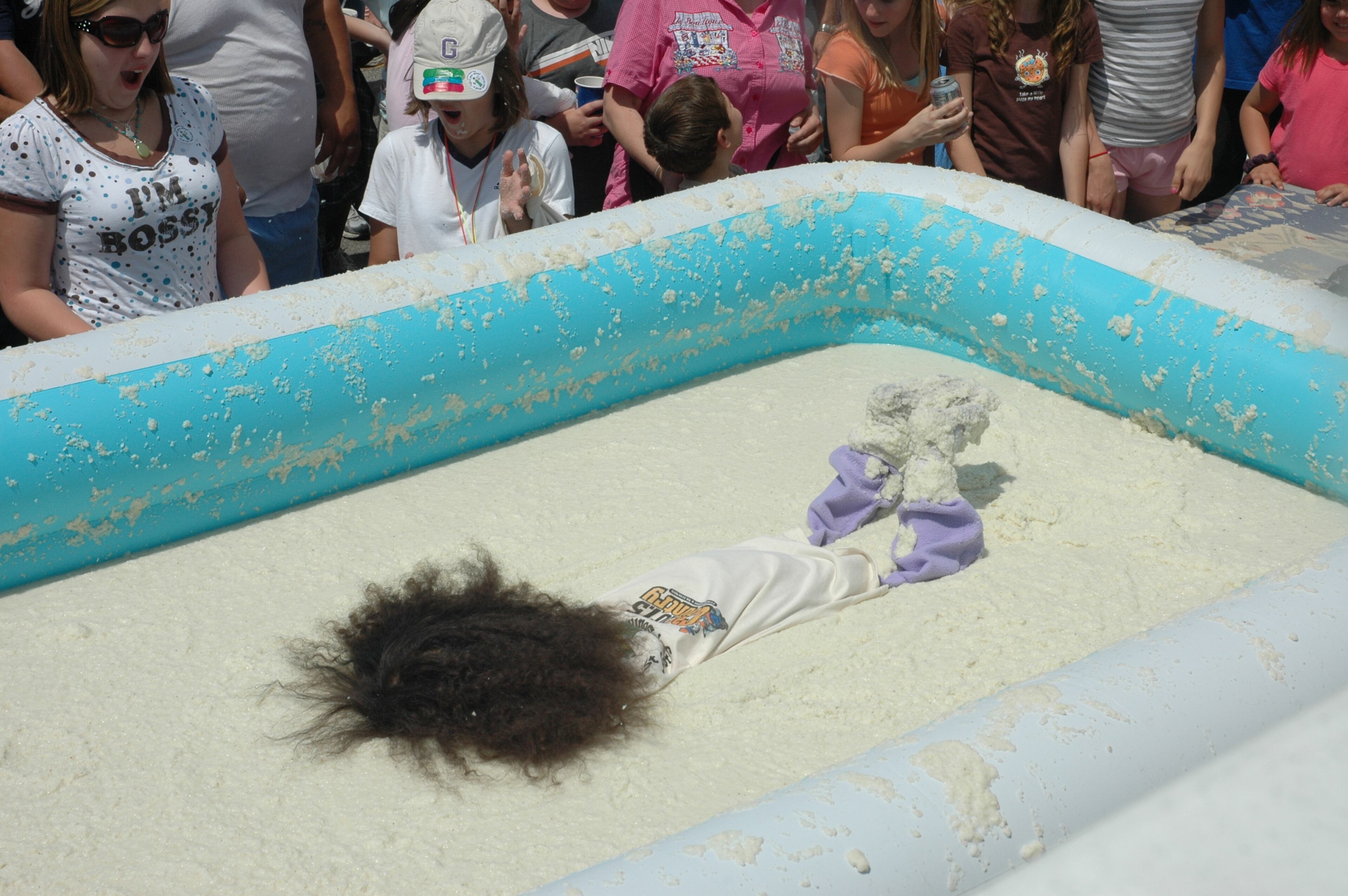 A Saint George, S.C. child takes a dive headfirst into a pool of grits. CREDIT: Courtesy Saint George World Grits Festival. HANDOUT PHOTO - NOT FOR RESALE
