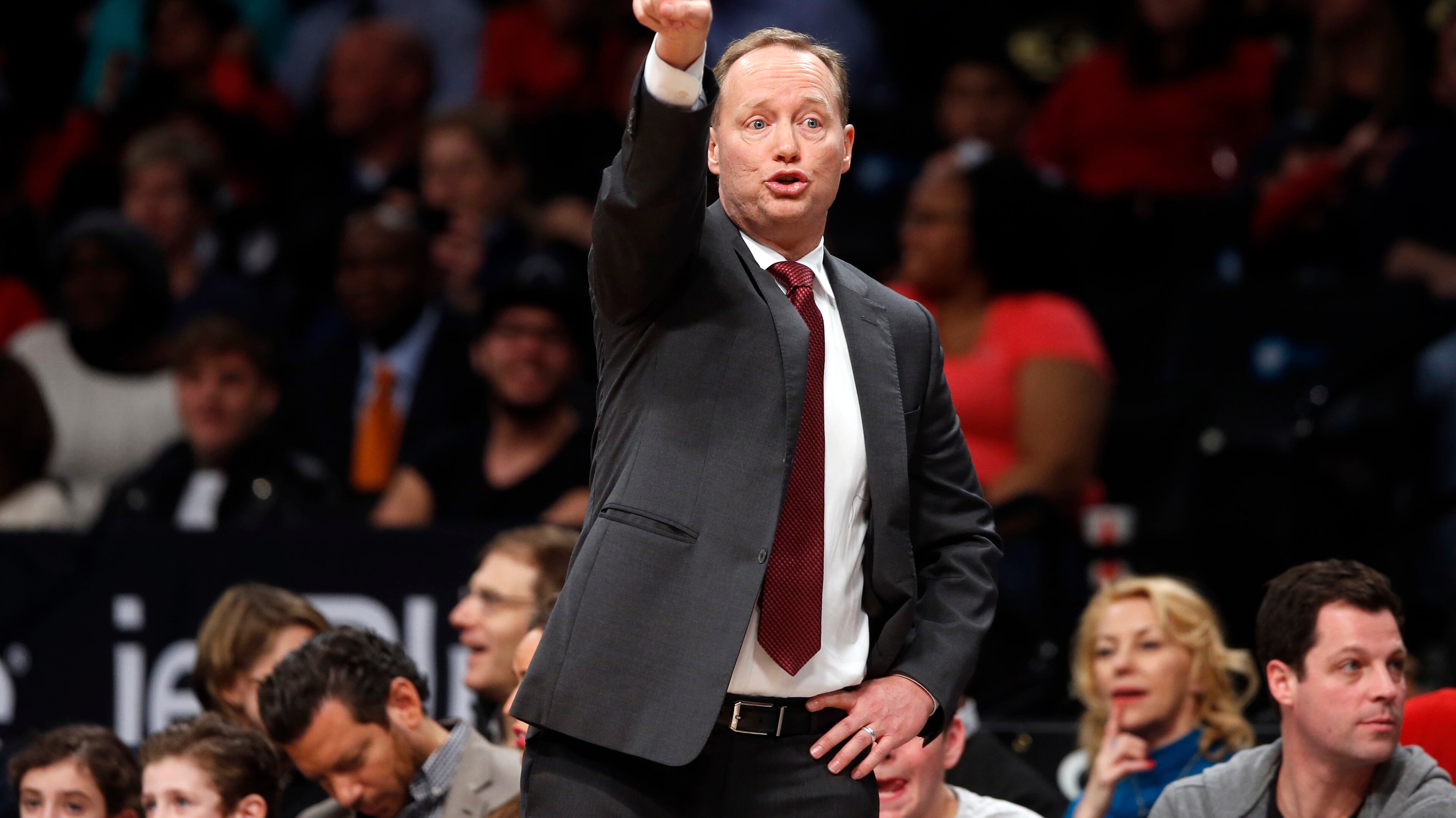 Atlanta Hawks coach Mike Budenholzer gestures to his team during the second quarter of an NBA basketball game against the Brooklyn Nets on Wednesday, April 8, 2015, in New York. (AP Photo/Jason DeCrow)