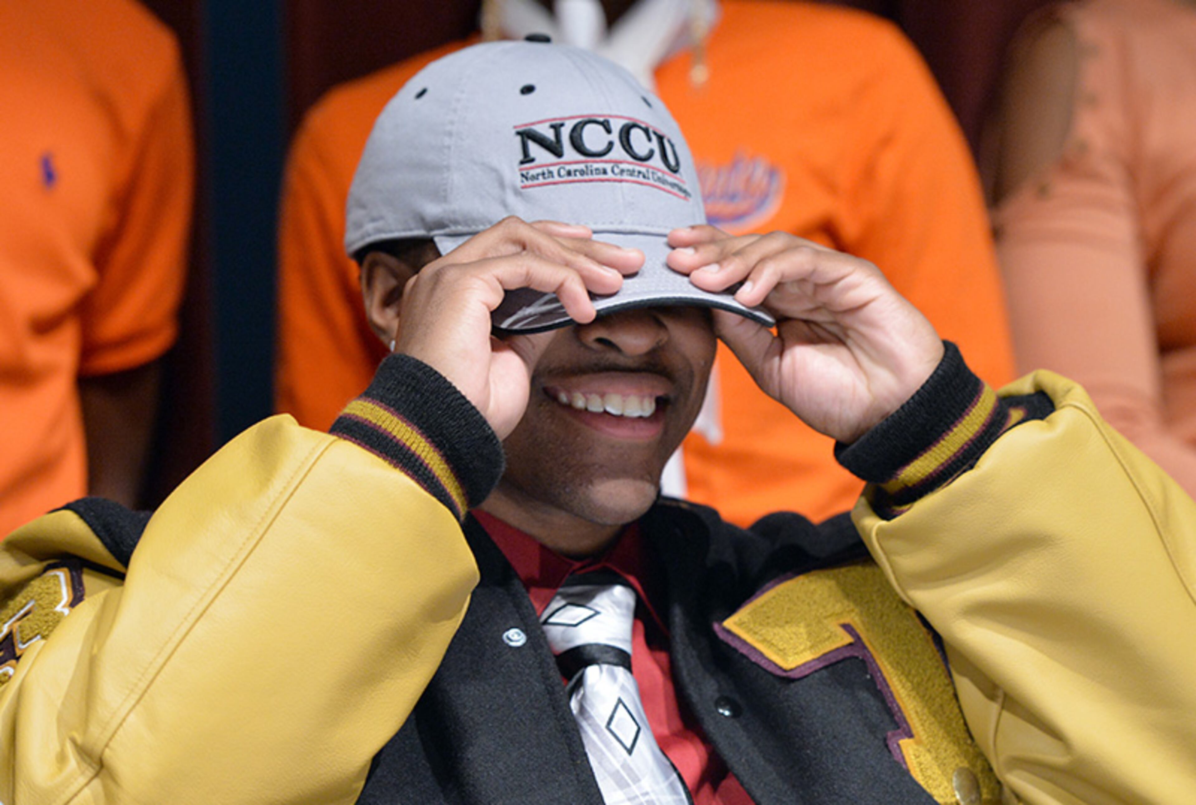 Davanta Reynolds announces his choice of North Carolina Central during signing day at Tucker High School.