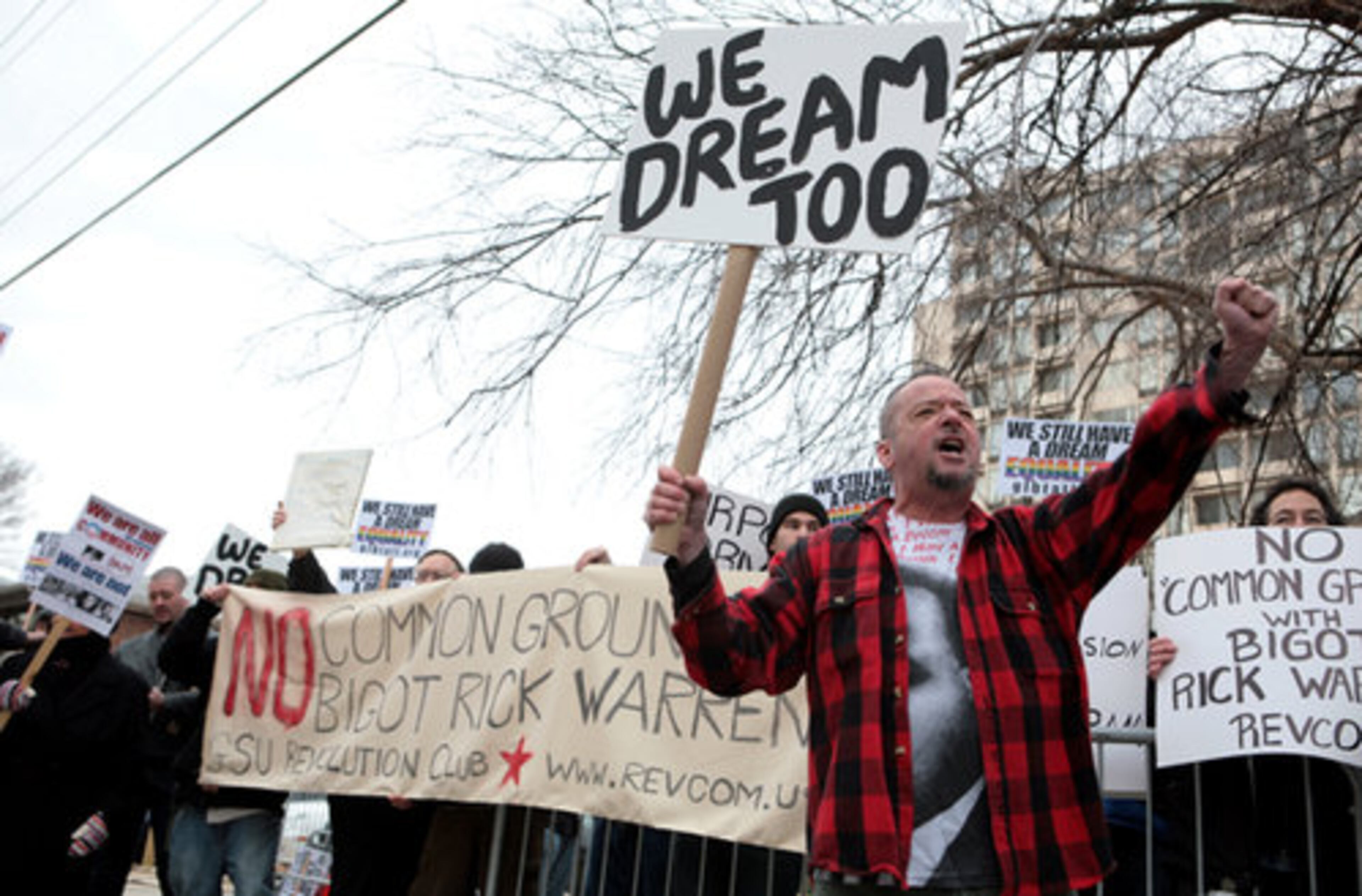 John Morse of Atlanta protests Rick Warren's appearance at Ebenezer Baptist Church.