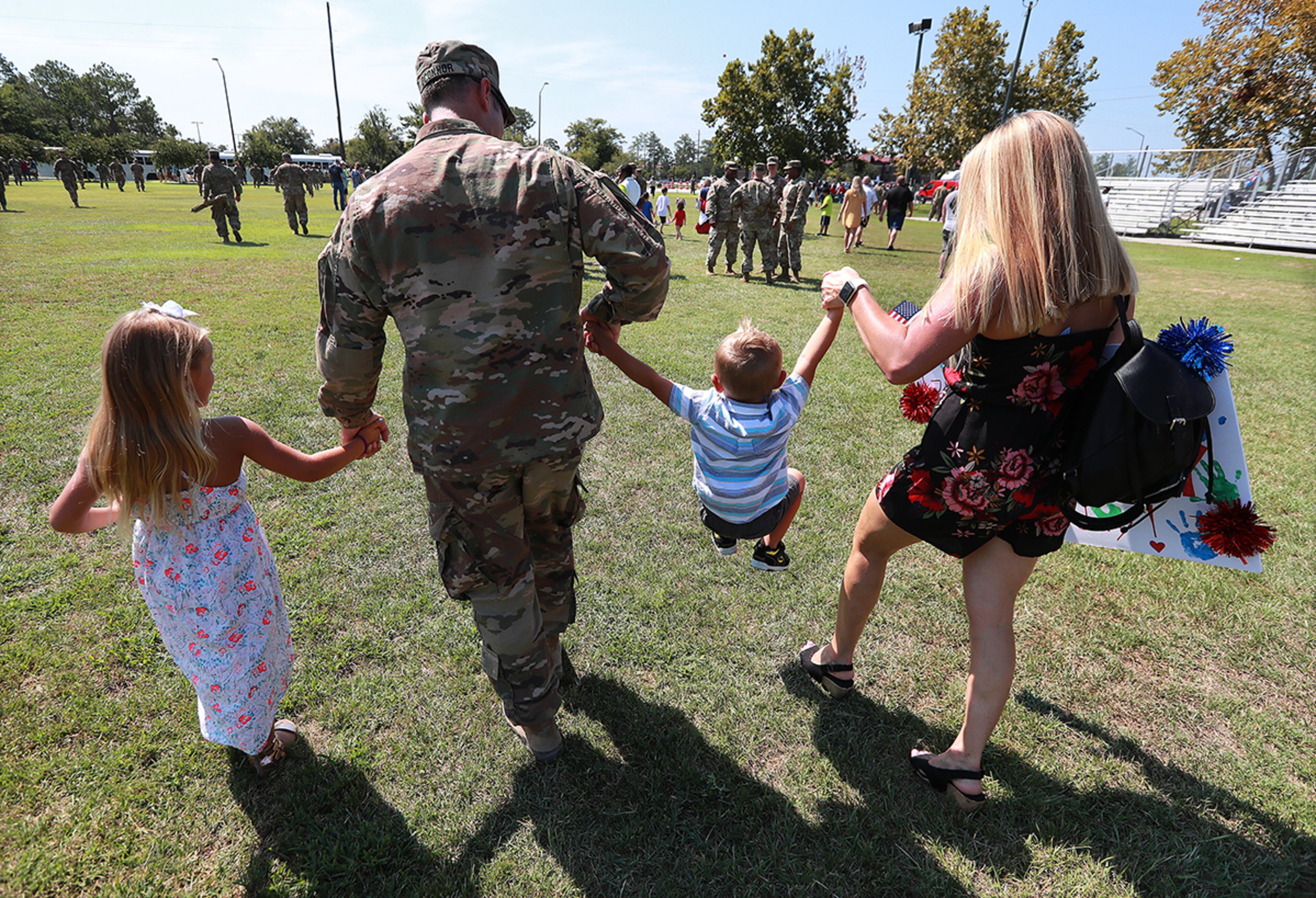 July 30, 2019 Fort Stewart: Sergeant Sean Oââ¬â¢Conner, his wife Hallie, daughter Ella, 5, and son Easton, 2, head off for some family time as soldiers of the 48th Infantry Brigade Combat Team representing units from across the state return home from deployment to Afghanistan in support of Operation Resolute Support at Cottrell Field on Tuesday, July 30, 2019, in Fort Stewart. Curtis Compton/ccompton@ajc.com