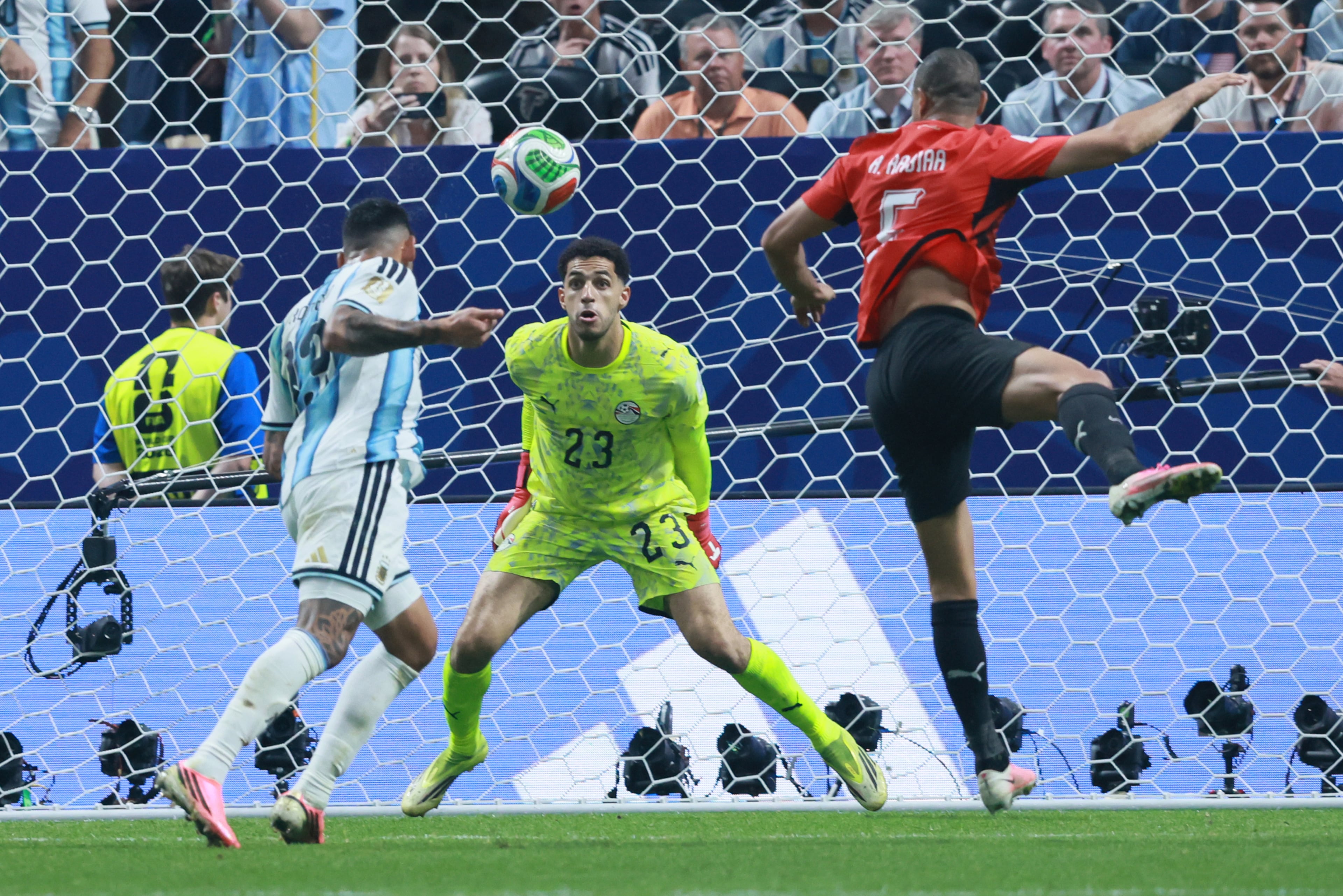 Cristian Romero scores Argentina's first goal past Egypt goalkeeper Mostafa Shoubir during second half of Argentina vs. Egypt FIFA World Cup match at Atlanta Stadium (Mercedes-Benz Stadium) on Tuesday, July 7, 2026. (Miguel Martinez/AJC)