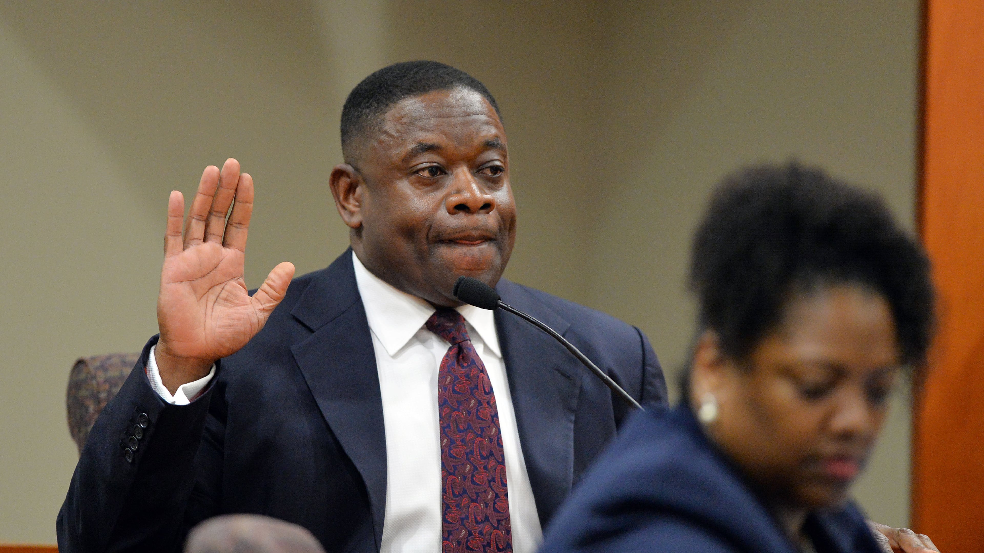 Former DeKalb County purchasing director Kelvin Walton is sworn in before he testifies Tuesday afternoon in the retrial of embattled DeKalb County CEO Burrell Ellis on corruption charges before Superior Court Judge Courtney L Johnson Tuesday, June 9, 2015. KENT D. JOHNSON /KDJOHNSON@AJC.COM