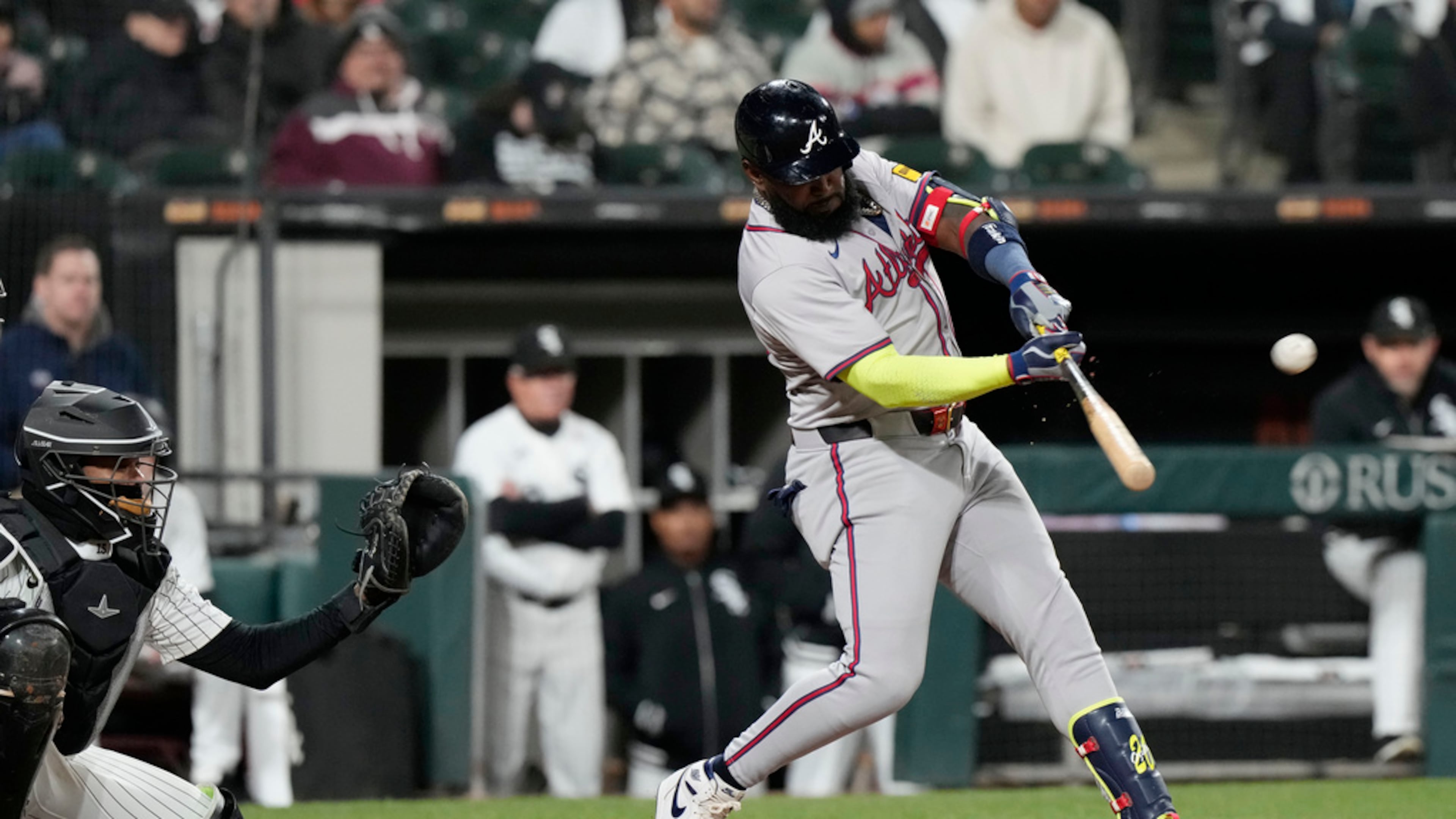 Atlanta Braves' Marcell Ozuna hits a solo home run during the ninth inning of a baseball game against the Chicago White Sox in Chicago, Tuesday, April 2, 2024. (AP Photo/Nam Y. Huh)