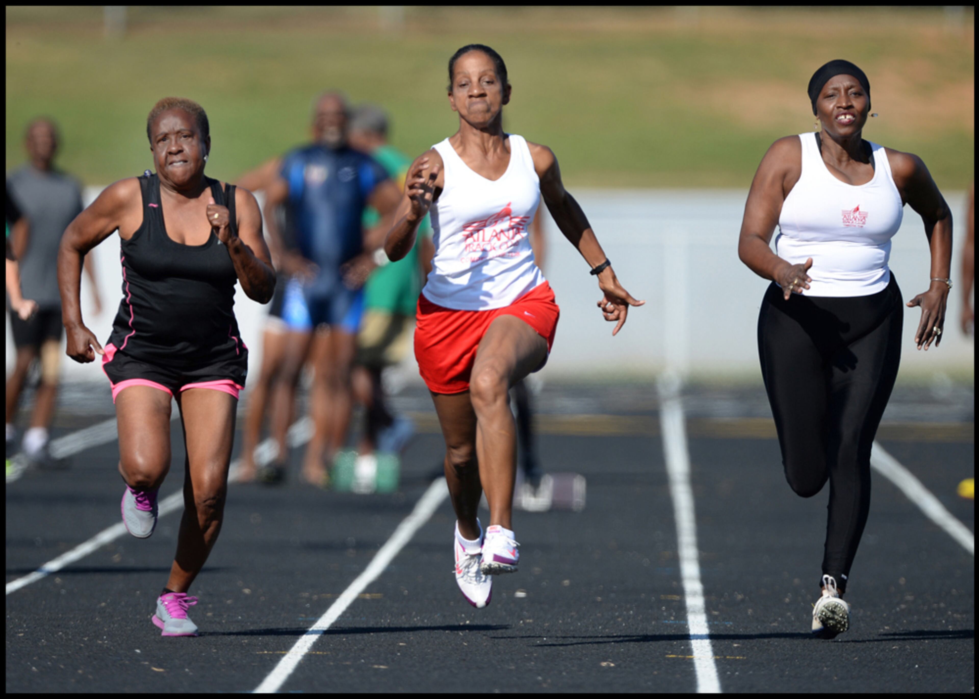 September 19, 2013 - Warner Robins, GA: My best track photo of 2013. (left to right) Naomi Robertson,66, Macon, Georgia; Linda Lowery,62, Decatur,Georgia; and Clovis Clark, ,58, Ellenwood, Georgia compete in the 50 meter race at the Thirty - First Annual Georgia Golden Olympics in Warner Robins, Georgia on Thursday, September 19, 2013. I have had the honor to photograph this event for over 20 years. Camera Nikon D4, Lens 500mm f4, ISO 250, Aperture f4, Shutter speed 1/2500. JOHNNY CRAWFORD / JCRAWFORD@AJC.COM