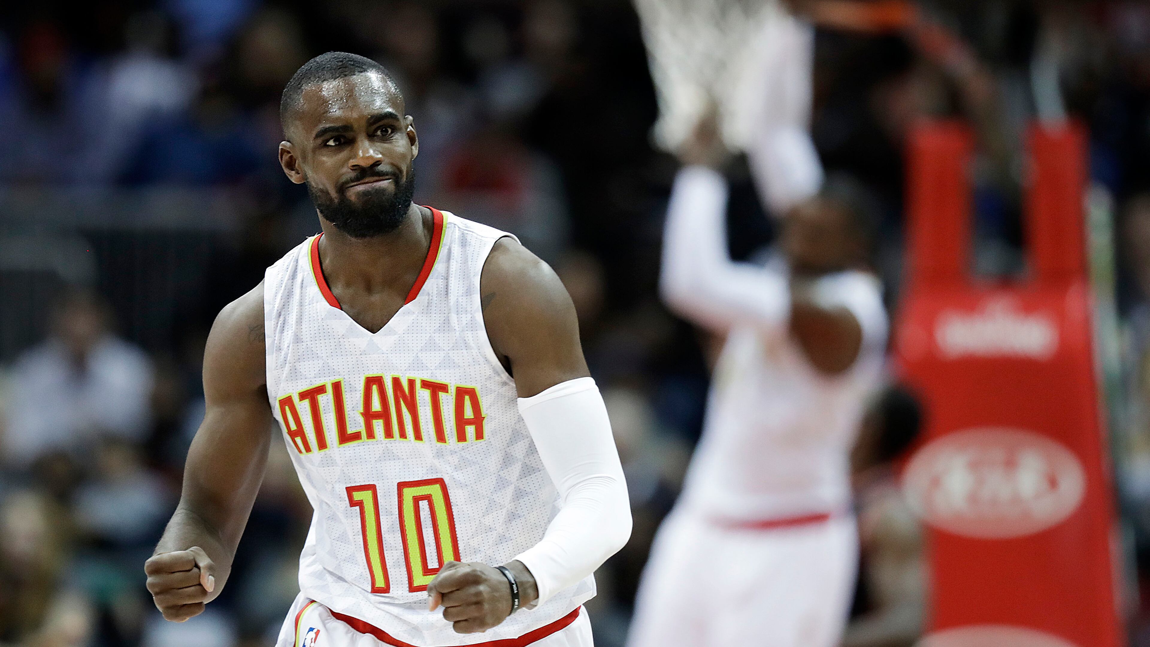 Atlanta Hawks’ Tim Hardaway Jr., left, celebrates after assisting teammate Paul Millsap, rear, for the dunk in the third quarter of an NBA basketball game against the Toronto Raptors in Atlanta, Friday, March 10, 2017. Atlanta won 105-99. (AP Photo/David Goldman)