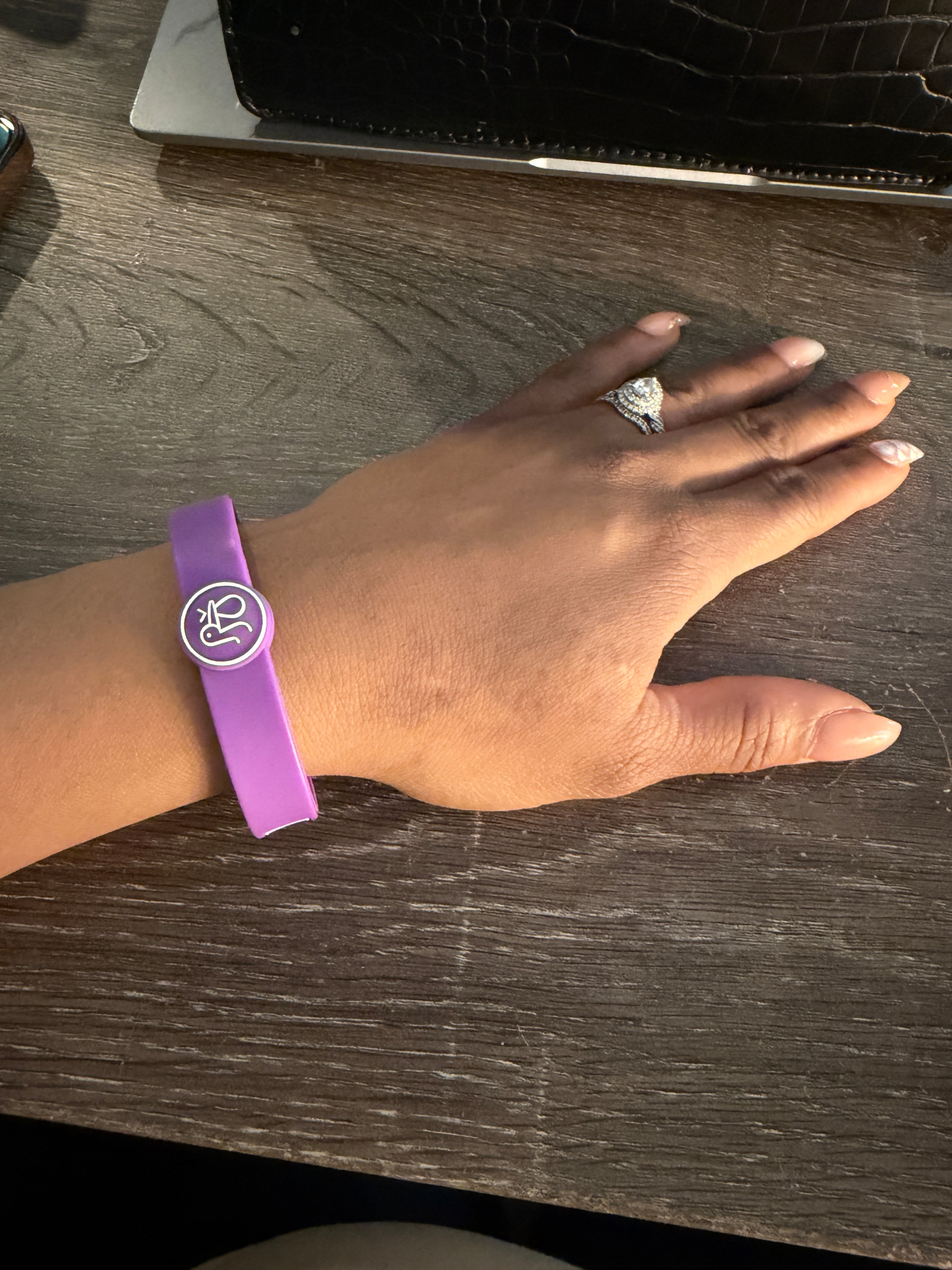 Metria Cauthen's purple Wellstar birth alert bracelet is a quick sign to healthcare providers that she could have pregnancy-related complications. (Courtesy of Metria Cauthen)