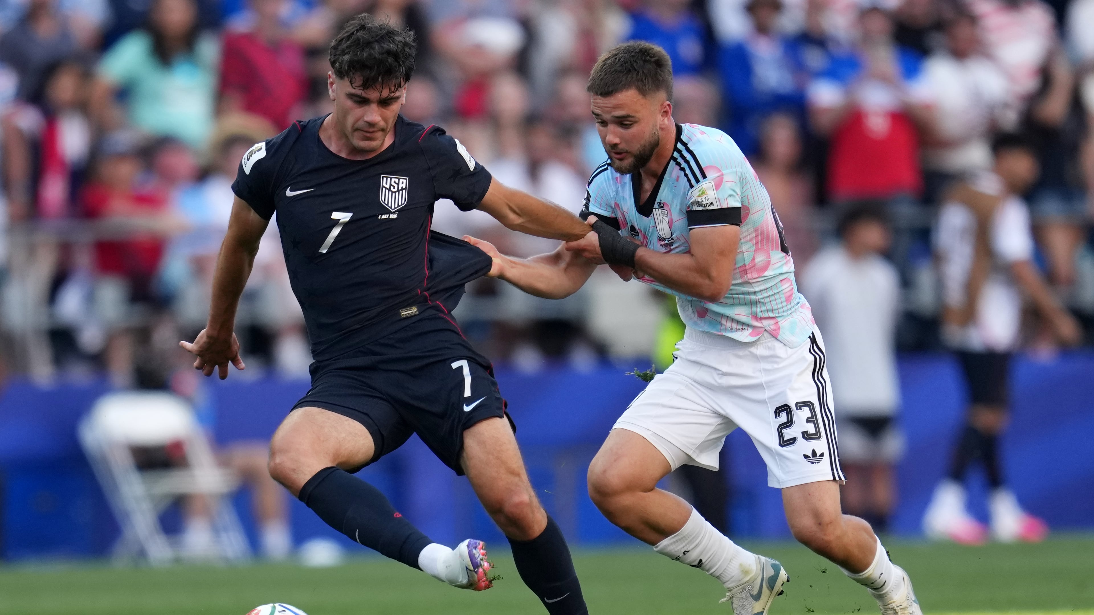 United States' Giovanni Reyna (7) controls the ball against Belgium's Nicolas Raskin (23) during the World Cup round of 16 soccer match between the United States and Belgium in Seattle, Monday, July 6, 2026. (AP Photo/Abbie Parr)