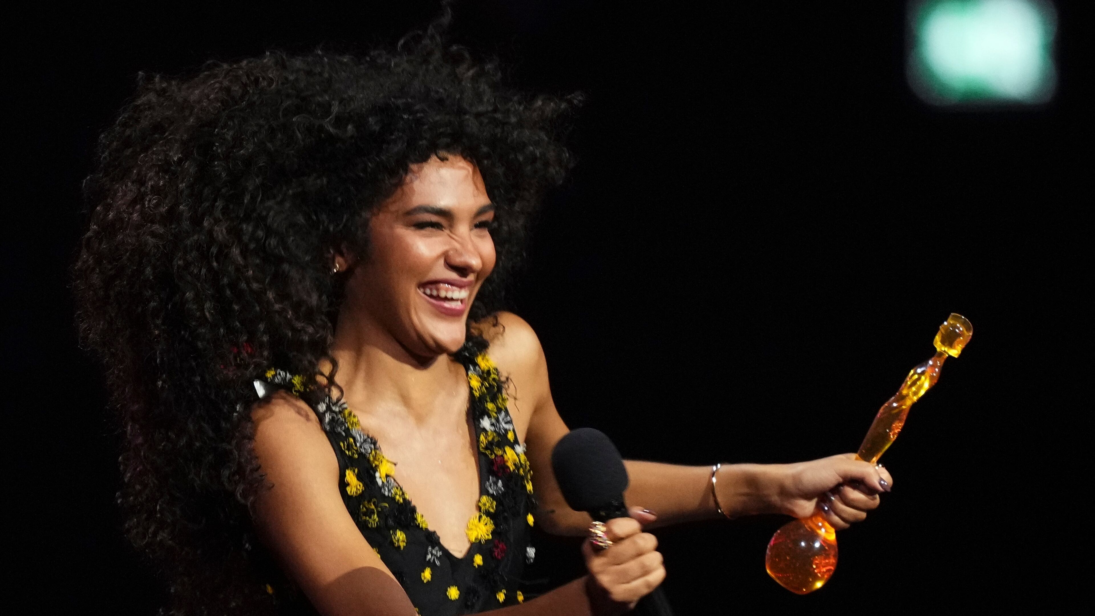 Olivia Dean wins the Pop Act award during the Brit Awards 2026 in Manchester, England, Saturday, Feb. 28, 2026. (Photo by Scott A Garfitt/Invision/AP)