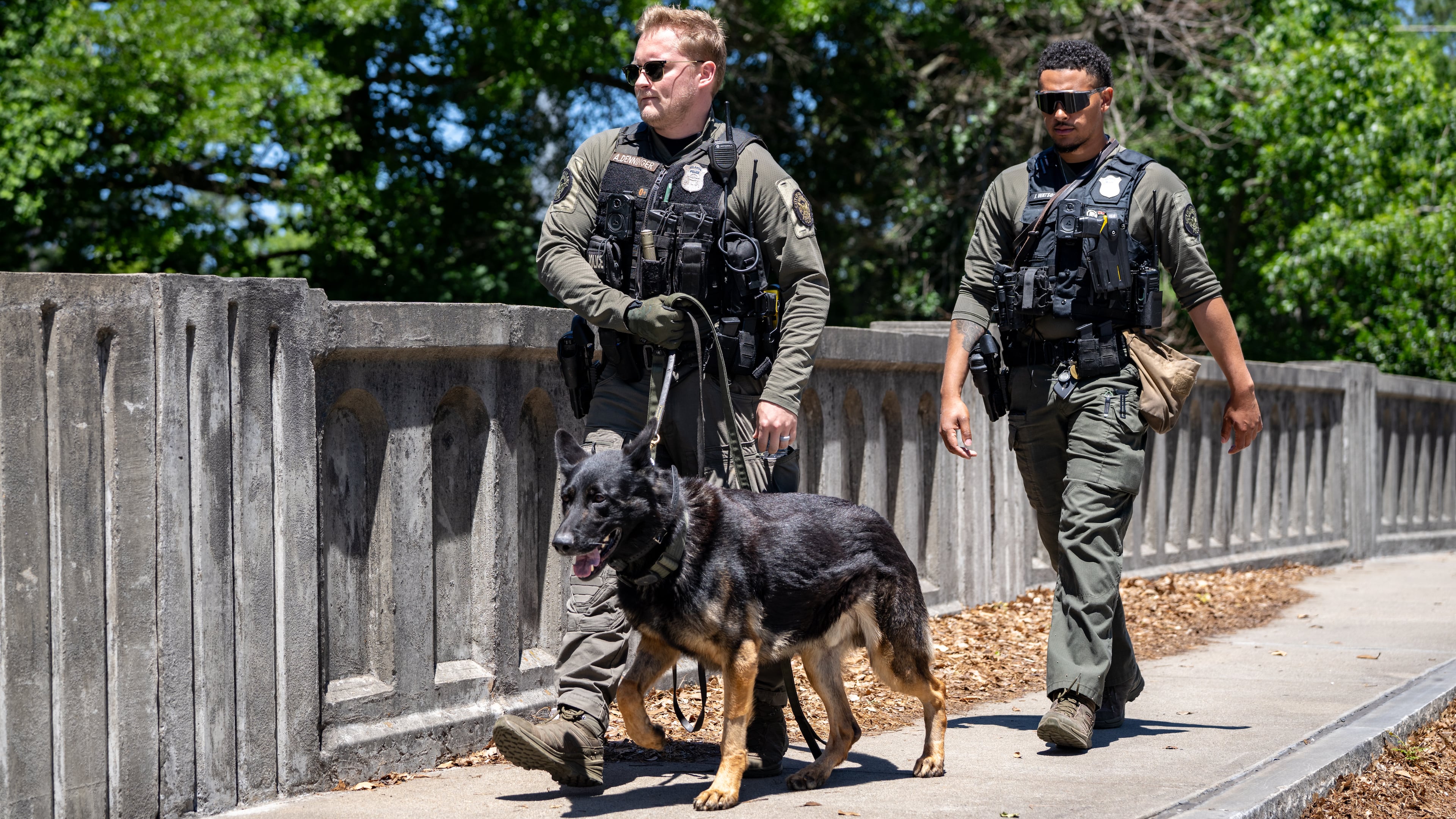 Atlanta Police K9 officers search the scene of a stabbing on the Beltline near Montgomery Ferry Drive, Thursday, May 14, 2026. (Ben Hendren for the AJC)