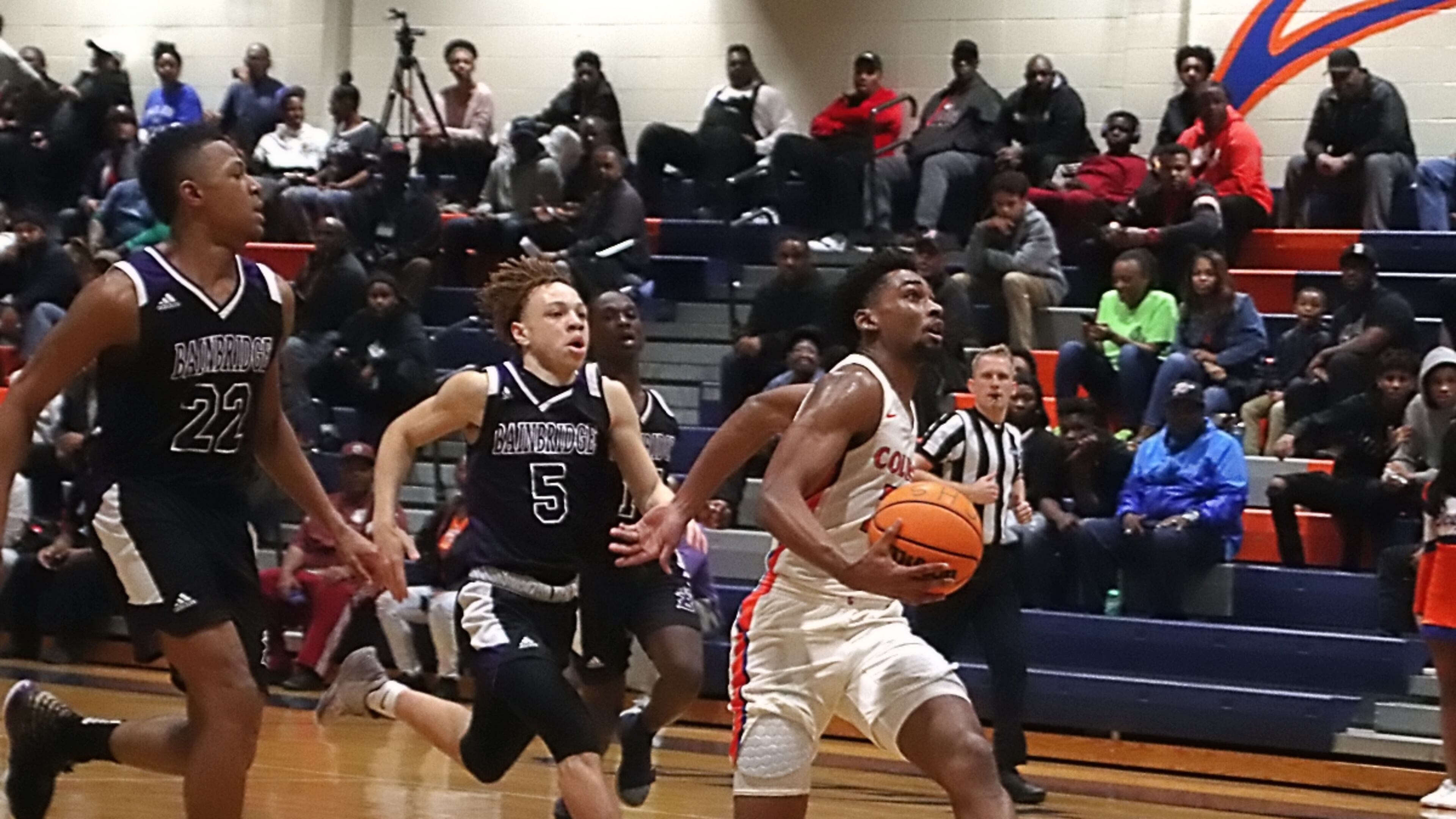 Columbia’s Devin Longstreet drives to complete a fast break.