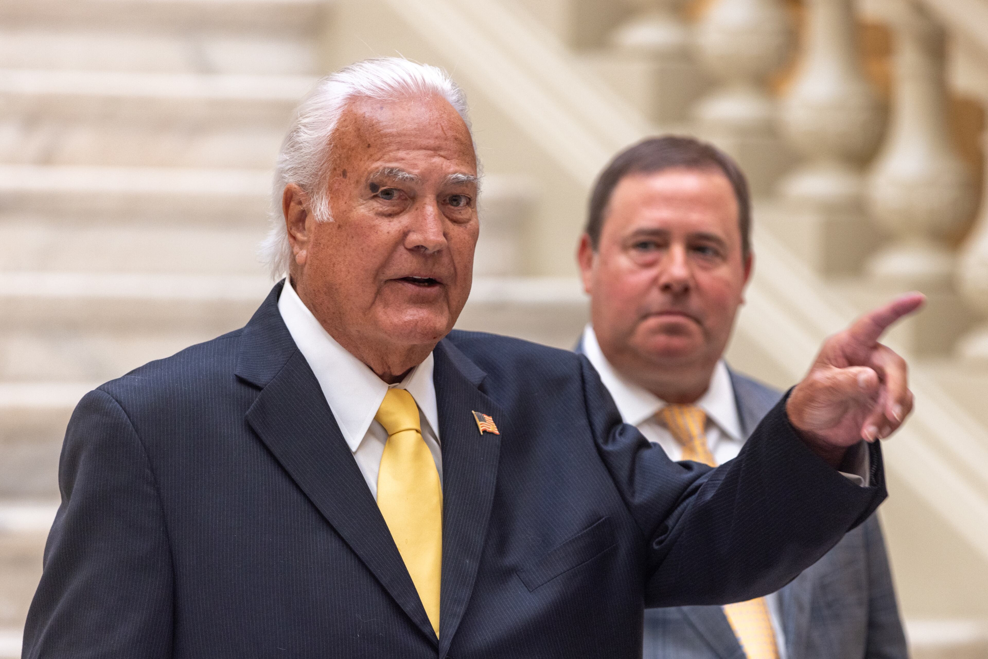 Georgia Public Service Commissioner Lauren “Bubba” McDonald (left) made a motion to lower the top end of Georgia Power’s earnings band from 11.9% to 11.4%, but the measure failed. (Arvin Temkar/AJC)