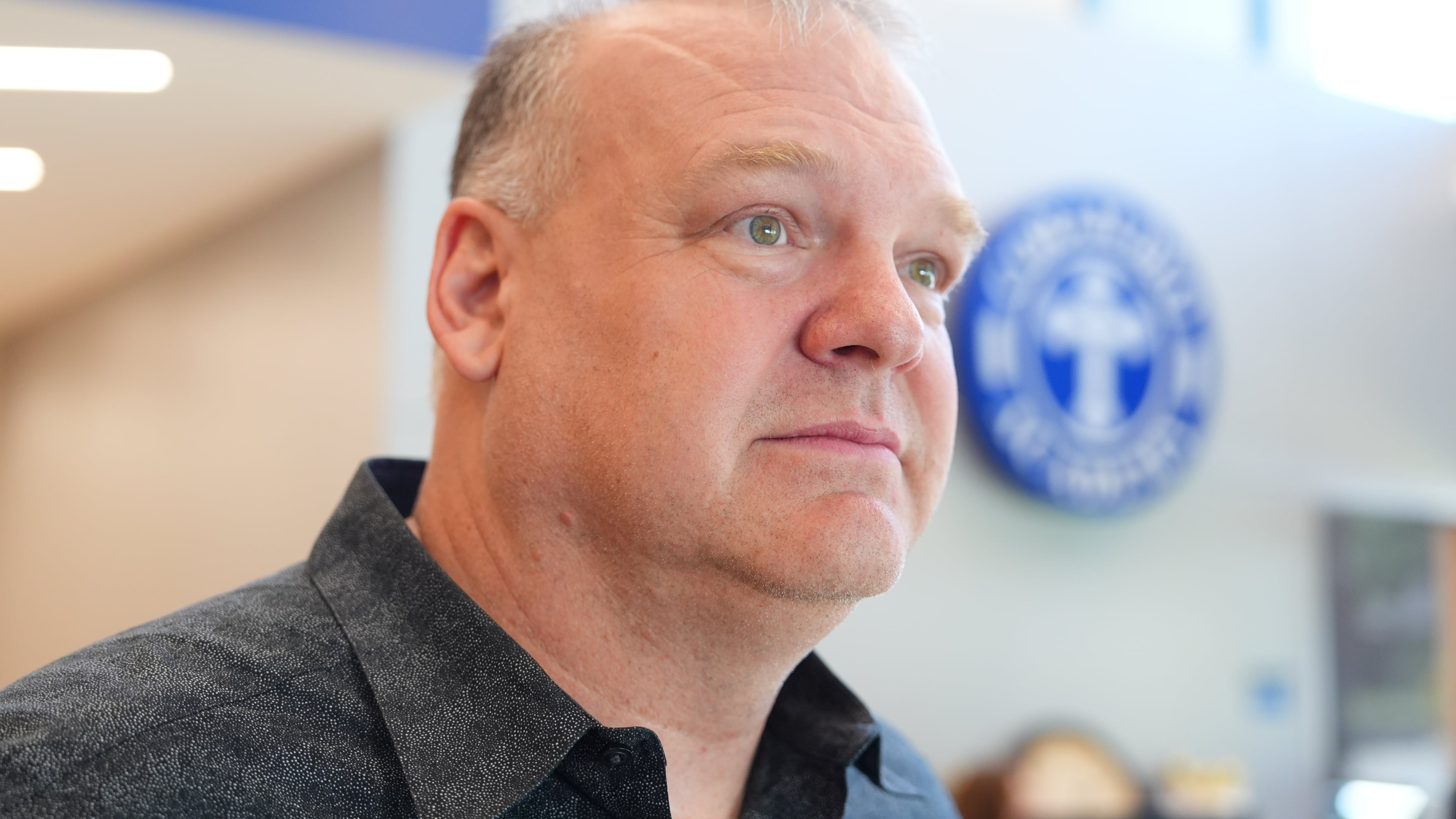 Keith Castello pauses during a conversation at Coram Deo Academy in Flower Mound, Texas, Tuesday, Aug. 11, 2026. (AP Photo/LM Otero)
