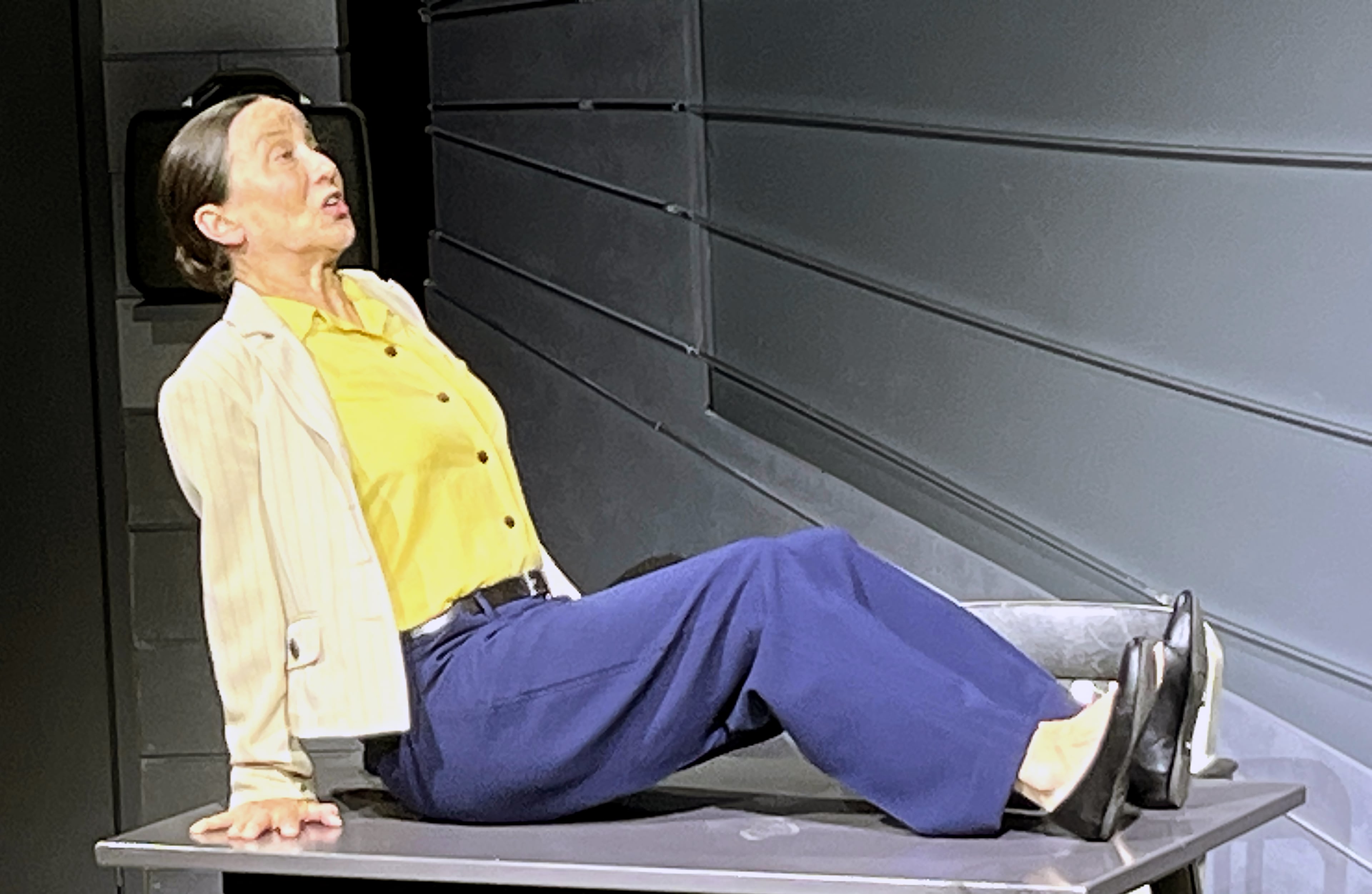 The set of "I Carry Your Heart With Me" is sparse: a desk, a chair, a few small props. Yet, Carolyn Cook's acting talent transforms each item into new environments as she recounts the stories of her character Esther's life.