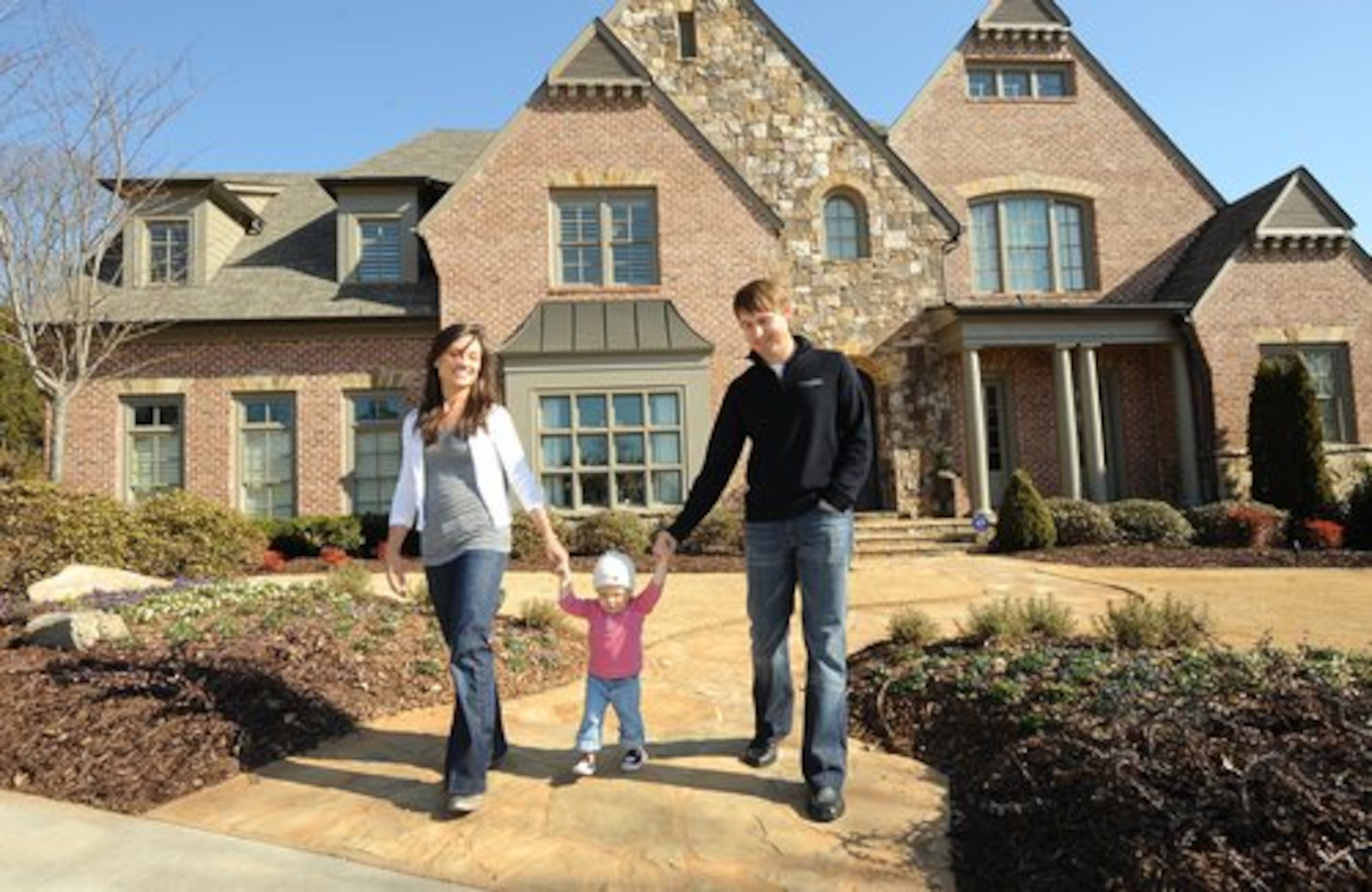 Text by CHRIS REINOLDS: Professional golfer Heath Slocum and his wife, Vicky, bought their five-bedroom home in 2006 after moving here from Pensacola, Fla. Familiarity -- Vicky grew up in Alpharetta -- and a great golf course nearby, Hawks Ridge in Ball Ground, lured them to the area. The home is about 7,500 square feet on 1.5 acres, plenty of room for their daughter Stella to explore.