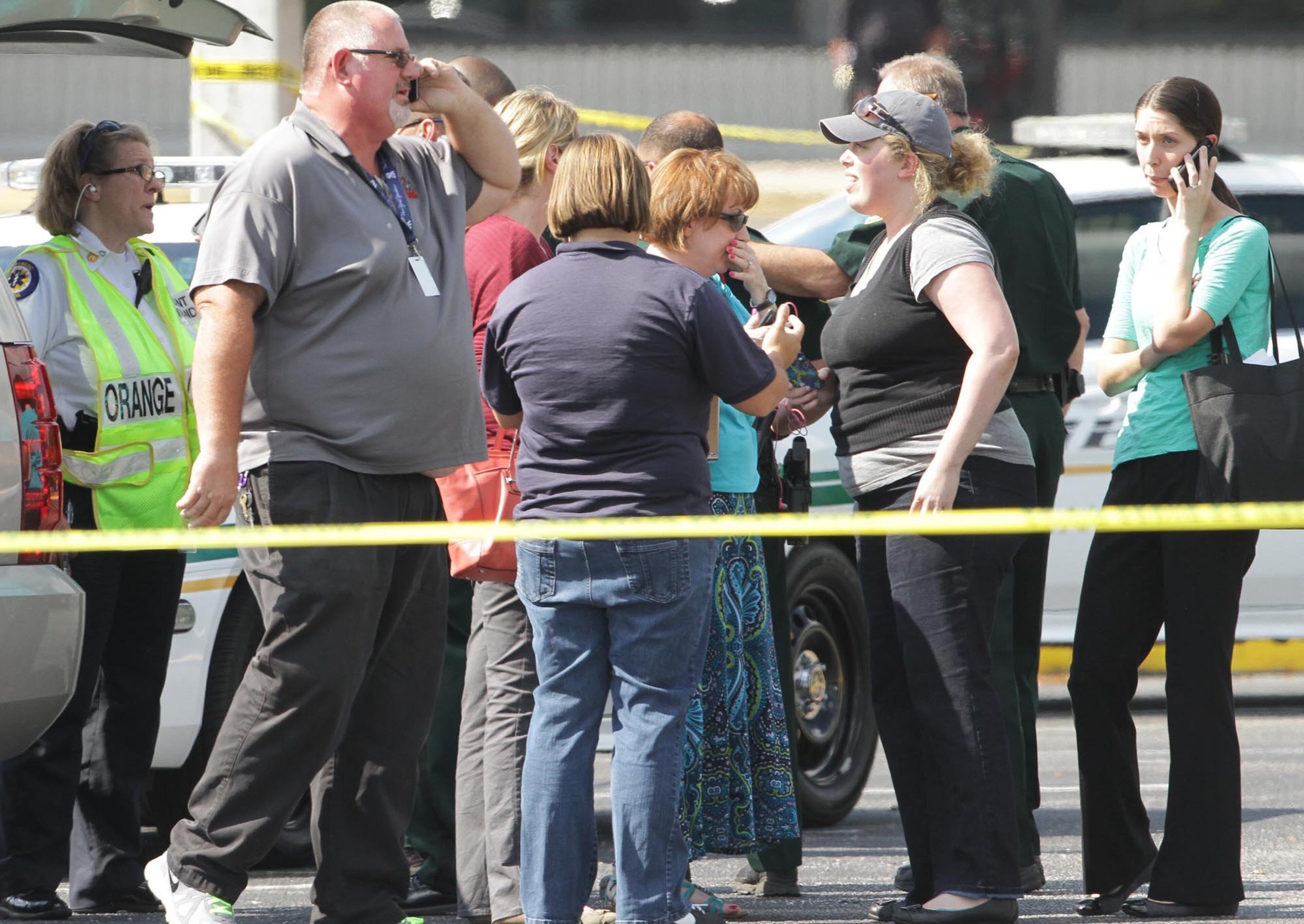 Rescue officials say 12 people, including 11 children, were injured when a car crashed into a Goldenrod Road day care center on Wednesday, April 9, 2014 in Winter Park, Fla. (Stephen M. Dowell, Orlando Sentinel/MCT)