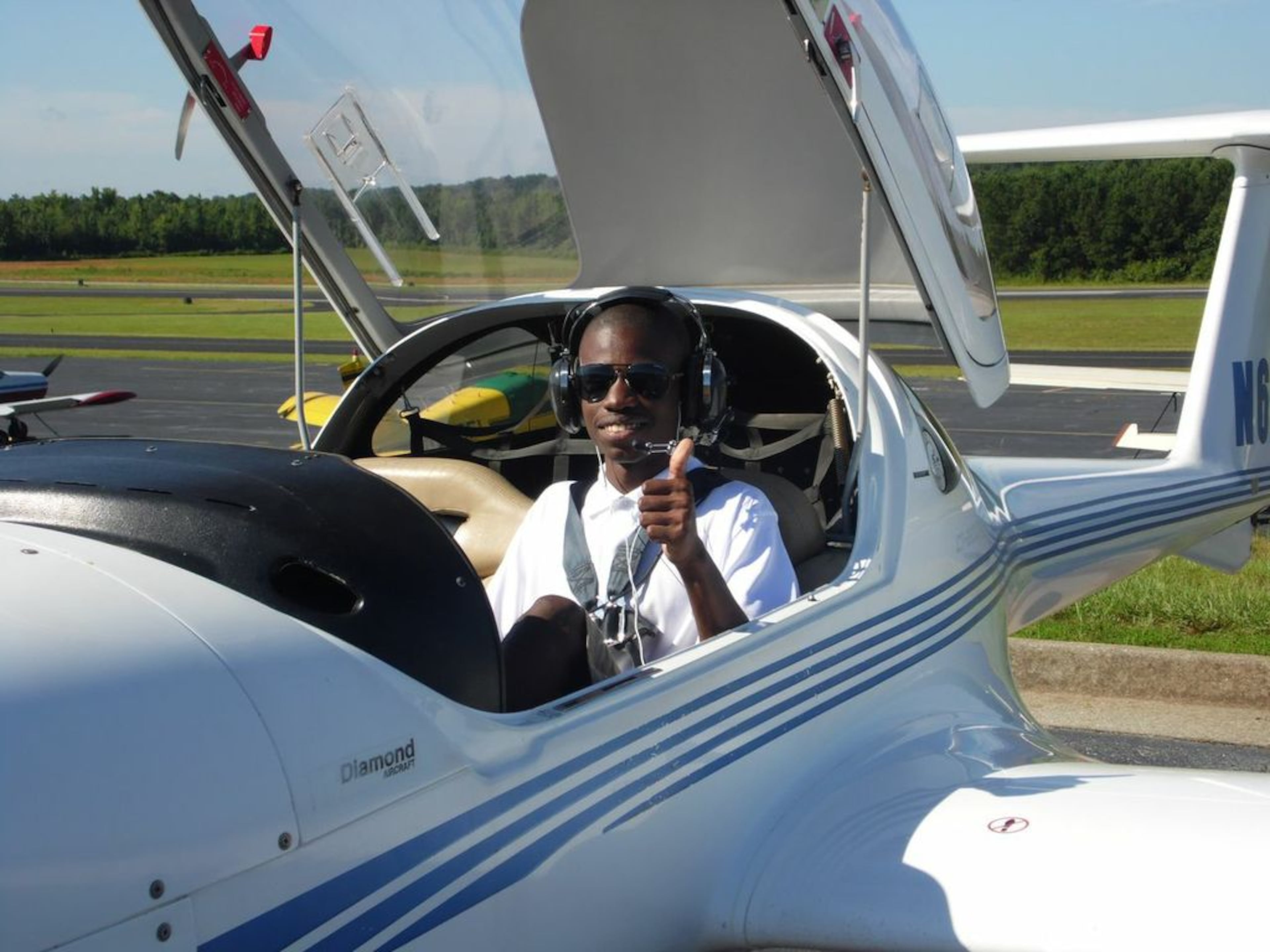 Tayvon Snowden, 16, of Decatur took two trains, a bus and a car to Peachtree City to participate in Flightline, one one of 30 academies sponsored by the Organization of Black Aerospace Professionals in 20 cities across the country for aspiring pilots ages 16-18. His perseverance garnered him this year's Charlie Tutt Outstanding Achievement in Aviation Award, given annually to the top student. He is shown here enjoying his first solo flight.