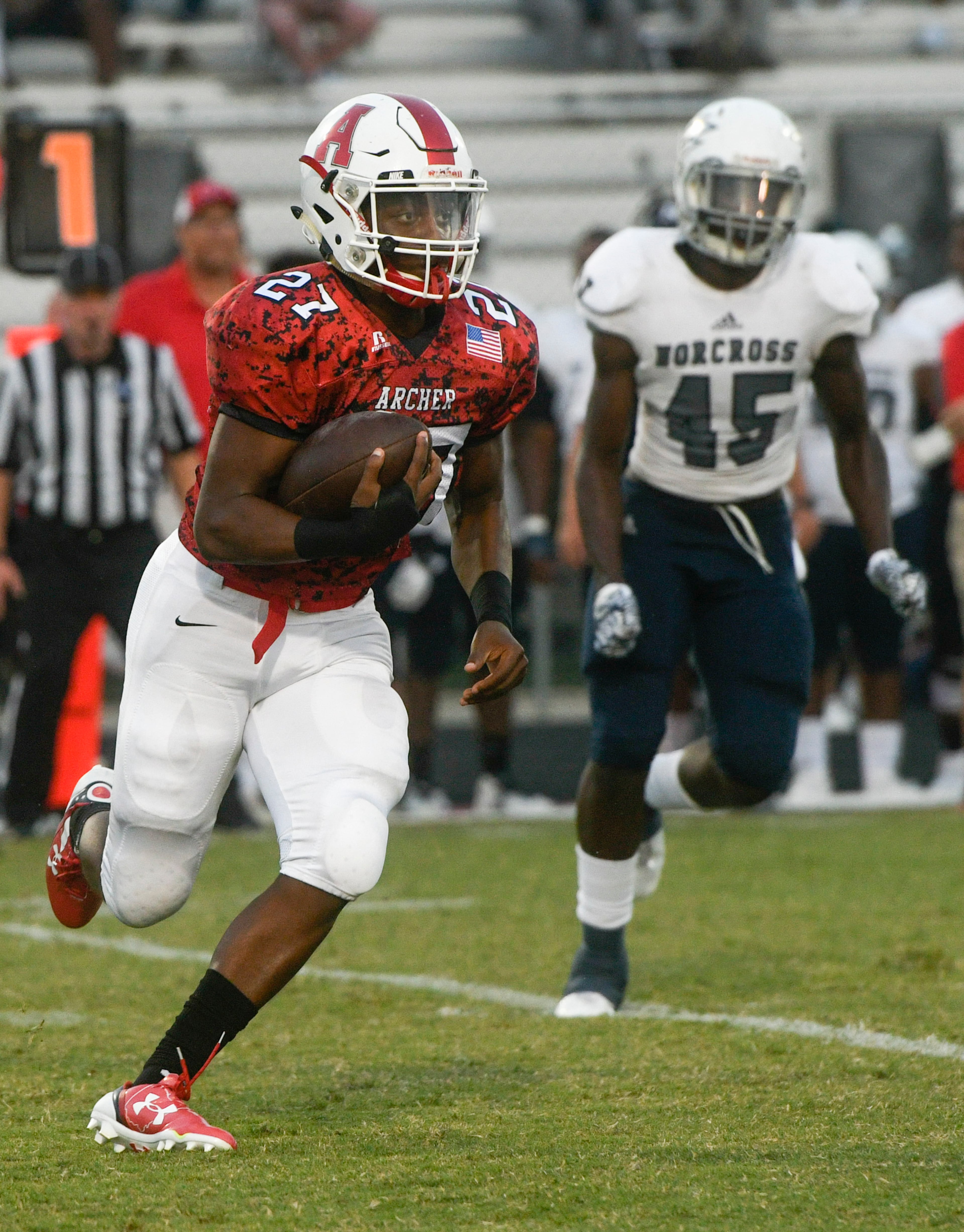 Archer RB Keegan Strickland, left, runs against the defense of Norcross DB Keyshaun Williford during a high school football game, Friday, Sept. 15, 2017, in Lawrenceville. (Special/John Amis)
