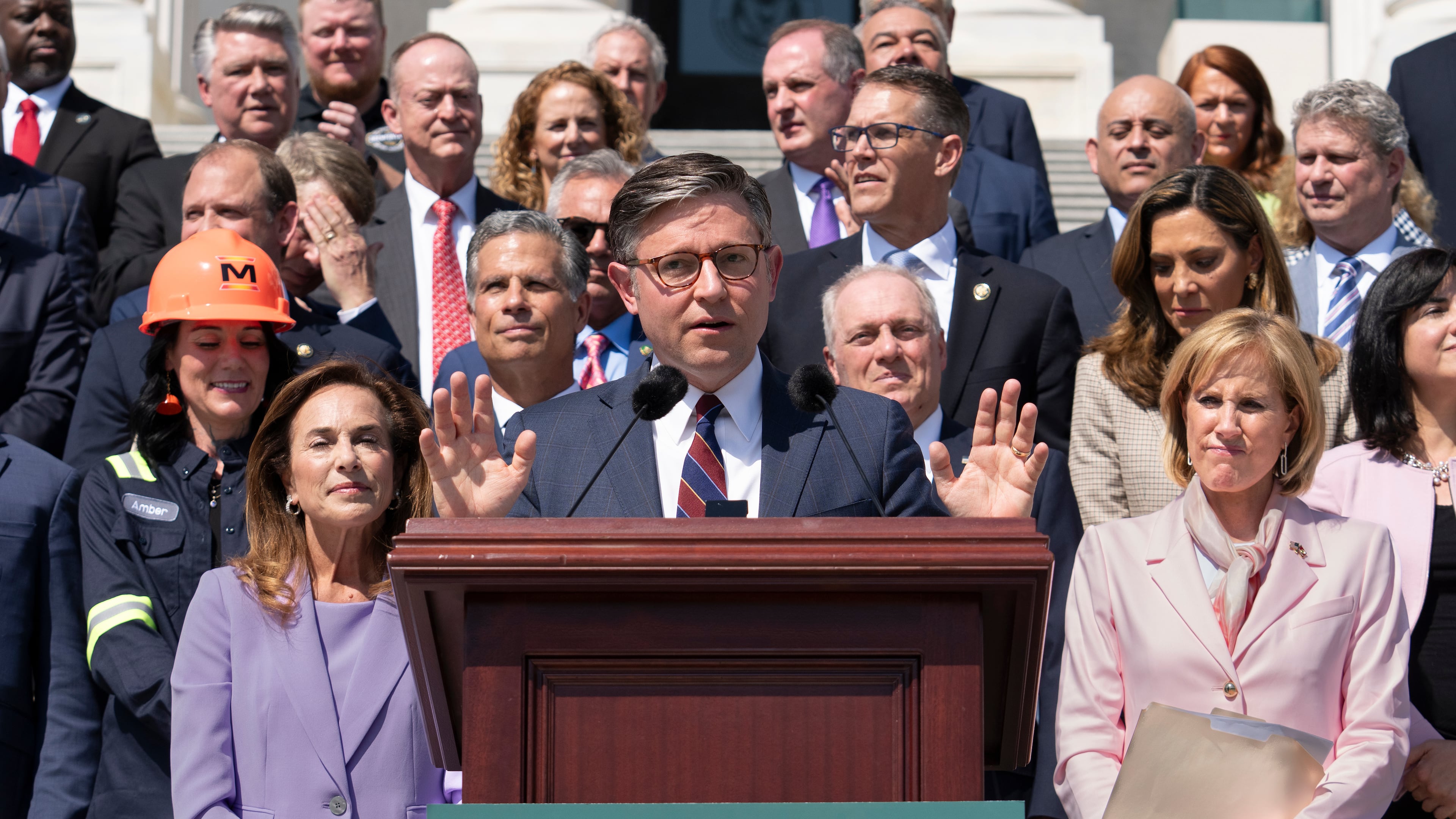 Speaker of the House Mike Johnson, R-La., and fellow Republicans celebrate GOP tax policies at an event outside the Capitol in Washington, Wednesday, April 15, 2026. (AP Photo/J. Scott Applewhite)