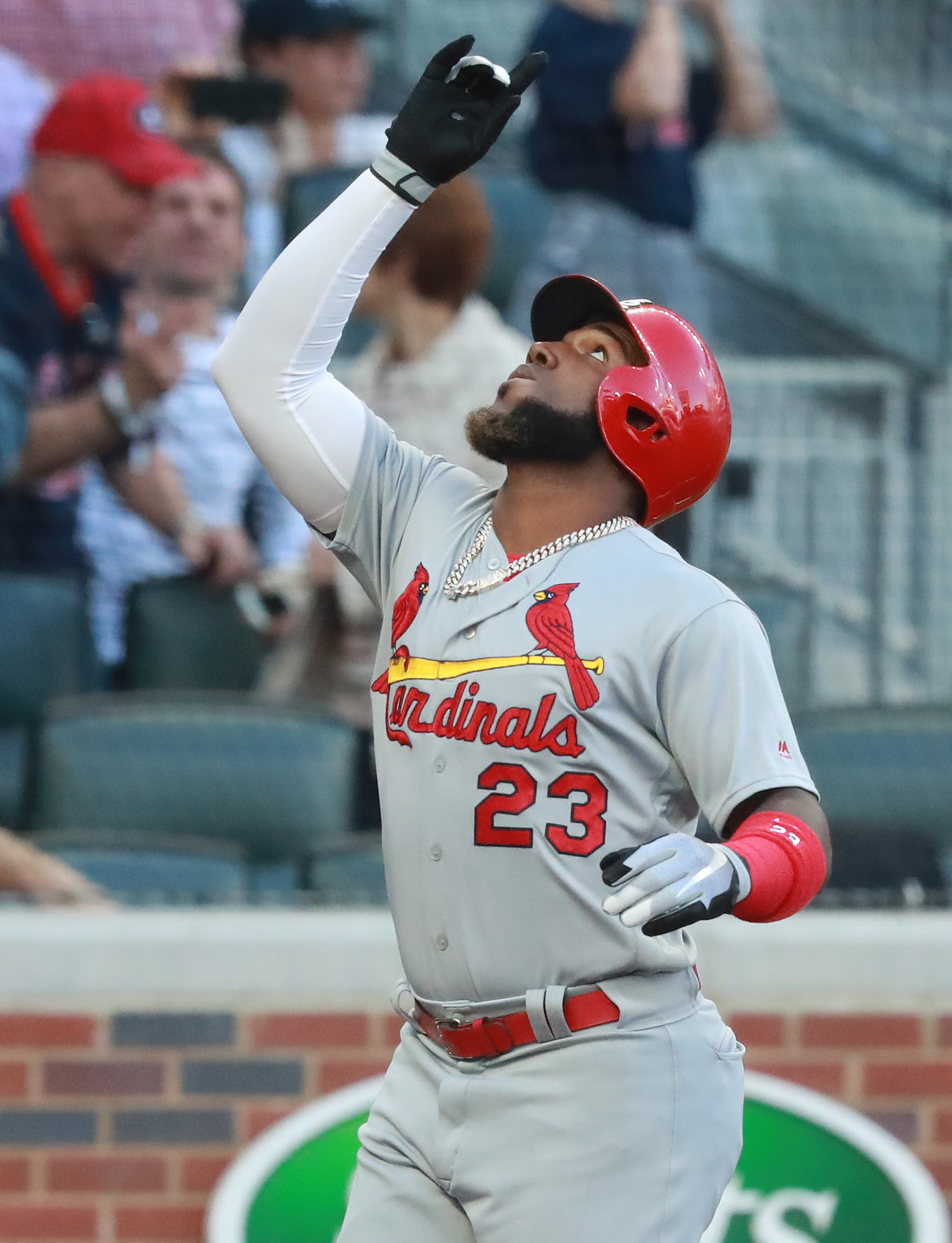 St. Louis Cardinals' Marcell Ozuna reacts to hitting a 3-run home run. Curtis Compton/ccompton@ajc.com