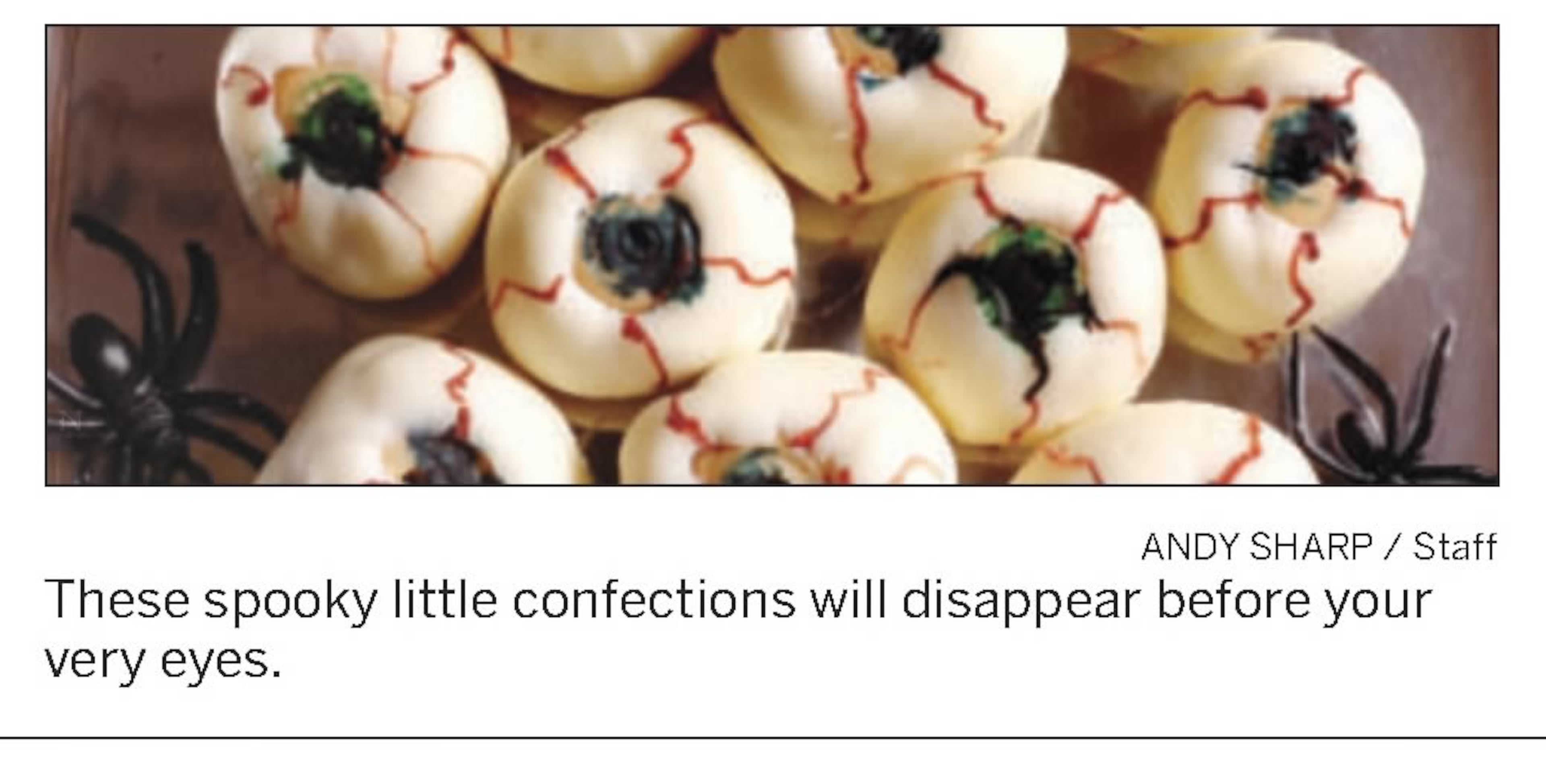 The original recipe photo for peanut butter eyeballs in 2007. Similar to the buckeye candy from Ohio, these sweet treats have a peanut butter filling that is rolled into a ball and dipped into melted chocolate. (Andy Sharp/AJC)