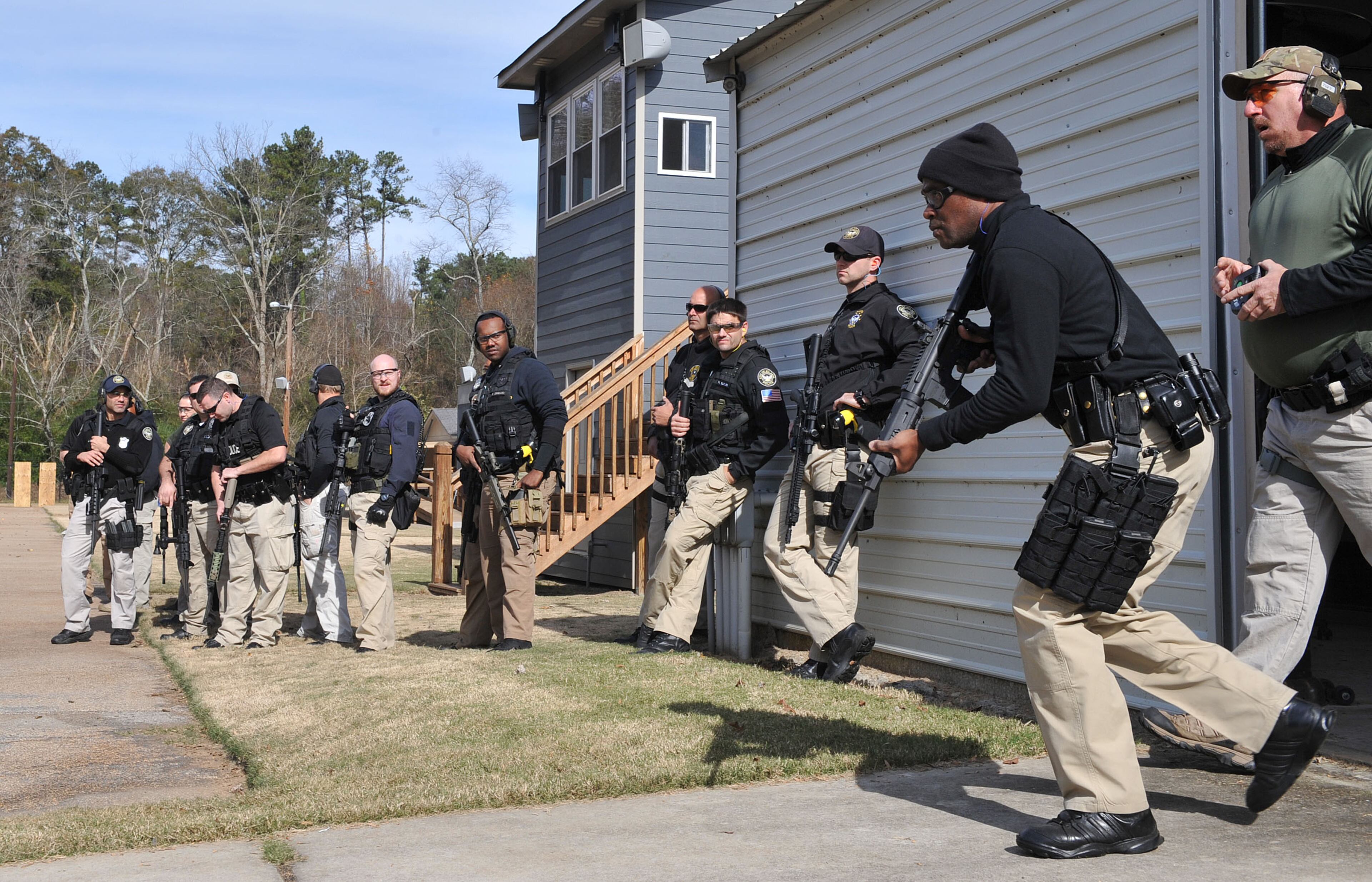 November 24, 2015 ATLANTA An officer starts his rotation. Officers with the Atlanta Police Department conduct advanced patrol rifle training at its firearms range Tuesday, November 24, 2015. The training was scheduled prior to the terrorist attacks in Paris and is for Department personnel who are equipped with enhanced weaponry. The patrol rifle training focused on enhancing officer skills when responding to active shooter incidents. The training included modules related to engaging multiple targets and increasing the officers speed in target acquisition, threat elimination, and reloading. The training is conducted regularly to ensure Atlanta patrol officers and members of specialized response units are prepared to respond to any occurrence where citizens of the city are targeted in an active shooting event. KENT D. JOHNSON/ kdjohnson@ajc.com