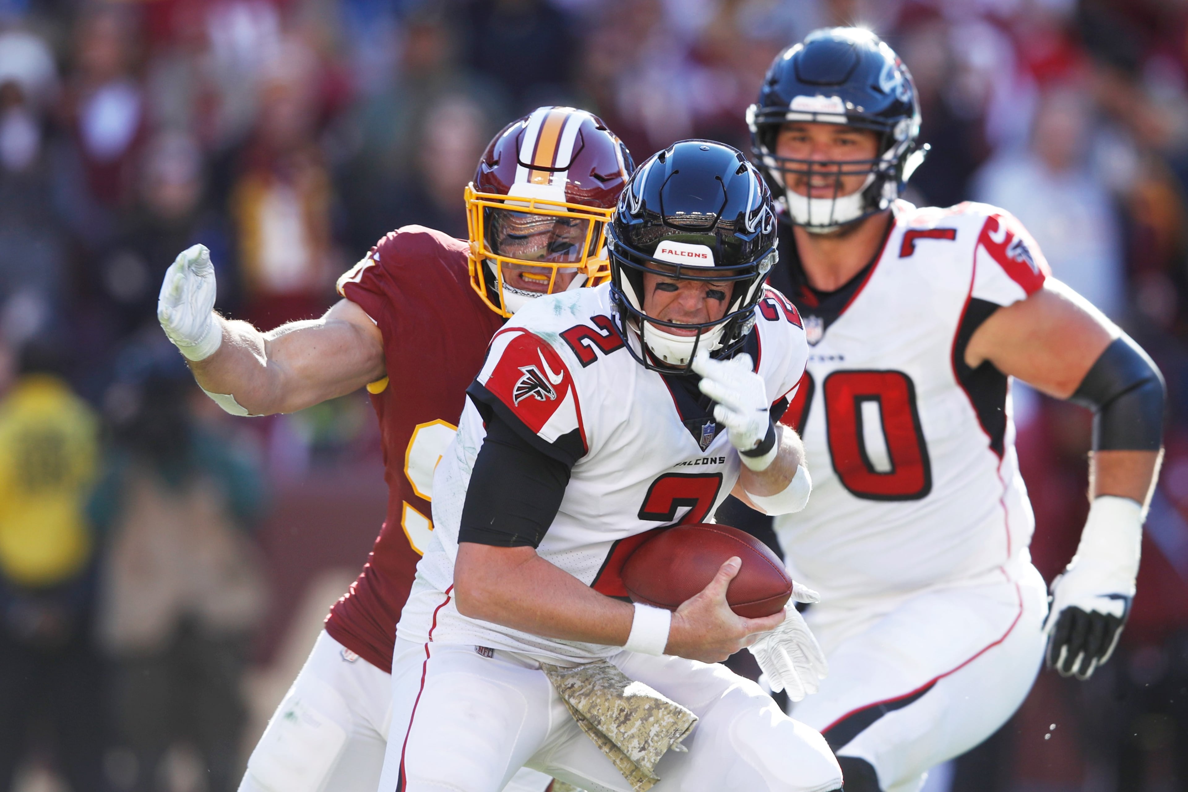 LANDOVER, MD - NOVEMBER 04: Matt Ryan #2 of the Atlanta Falcons gets sacked by Ryan Kerrigan #91 of the Washington Redskins in the second quarter of the game at FedExField on November 4, 2018 in Landover, Maryland. (Photo by Joe Robbins/Getty Images)