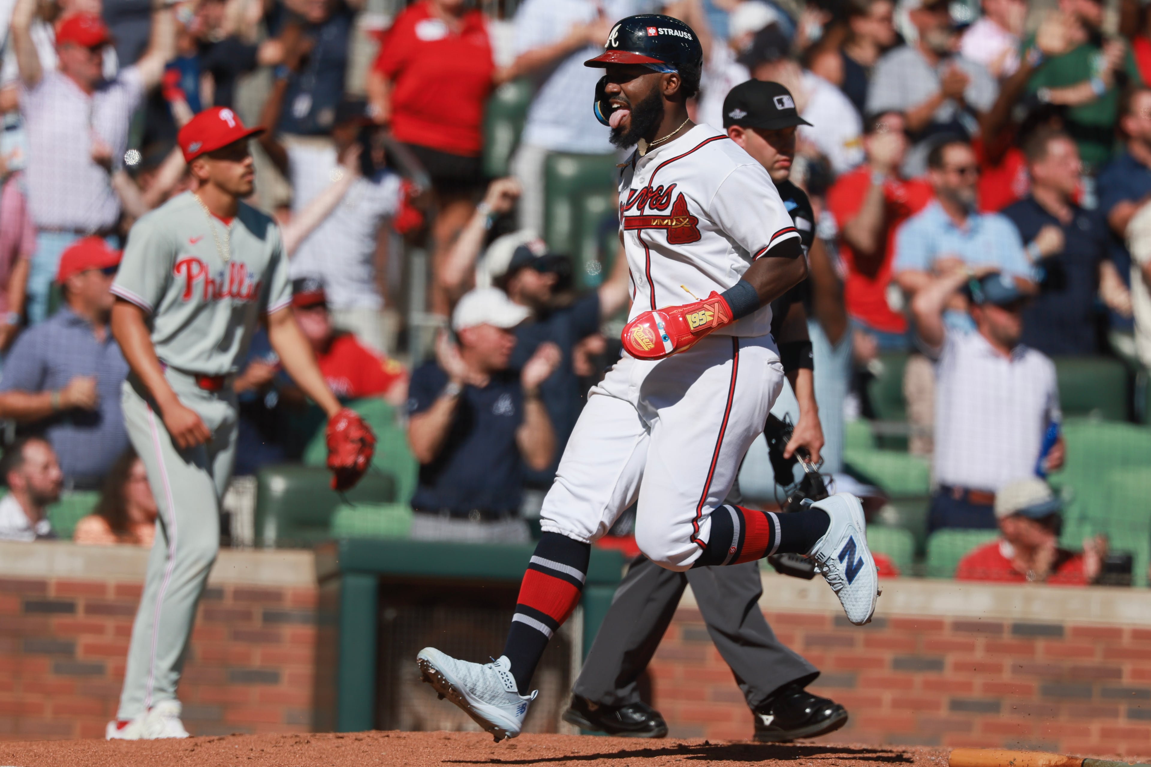 Atlanta Braves' Michael Harris II reacts while scoring against the Philadelphia Phillies during the sixth inning of Game 1 of a MLB National League Wild Card playoff series between the Atlanta Braves and the Philadelphia Phillies, Tuesday, Sept. 29, 2026, in Atlanta. (Jason Getz/AJC)
