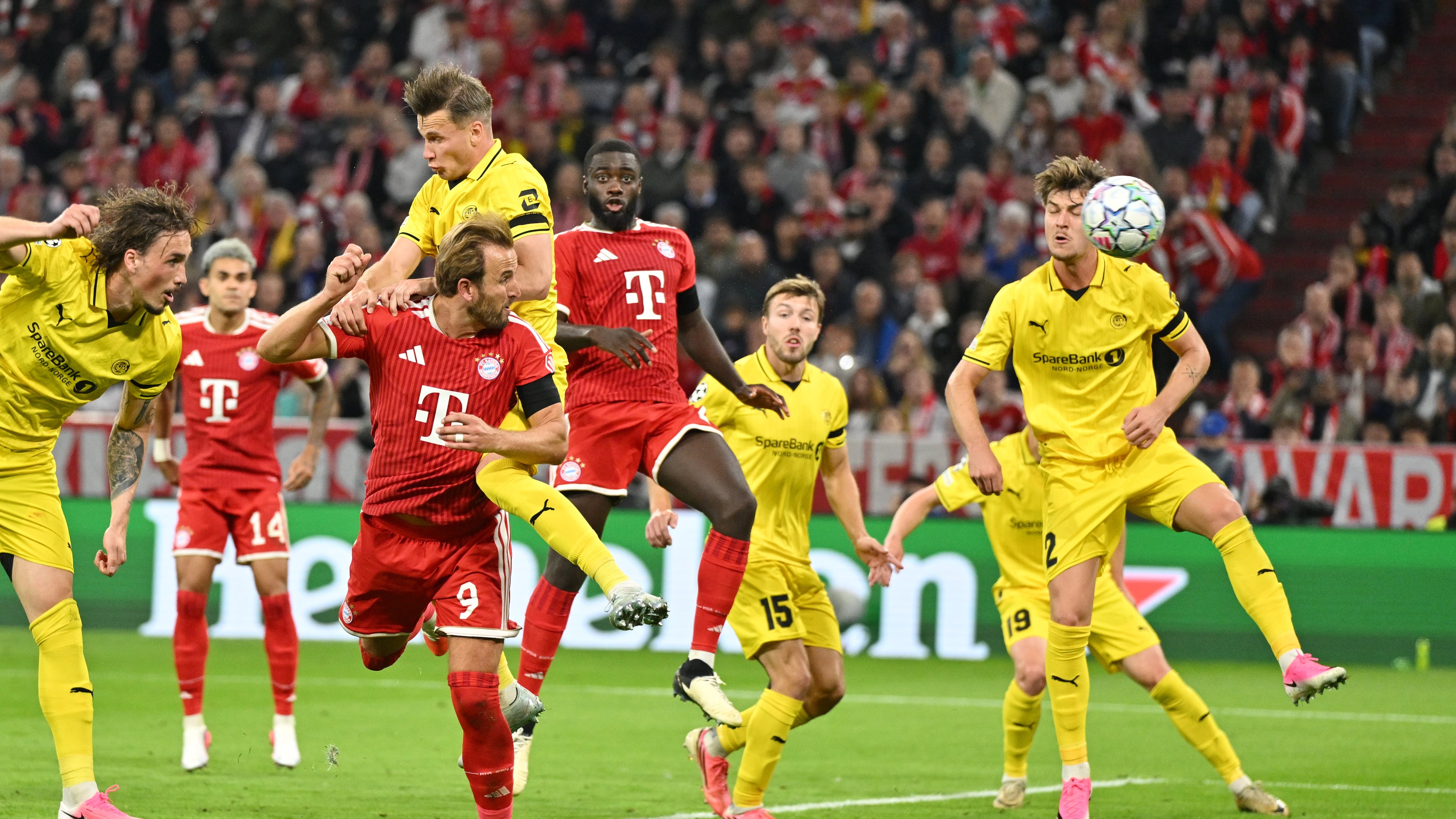 Bayern's Harry Kane, third from left bottom, scores his side's second goal during the Champions League opening phase soccer match between Bayern Munich and Bodo Glimt in Munich, Germany, Thursday, Sept. 10, 2026. (AP Photo/Lennart Preiss)