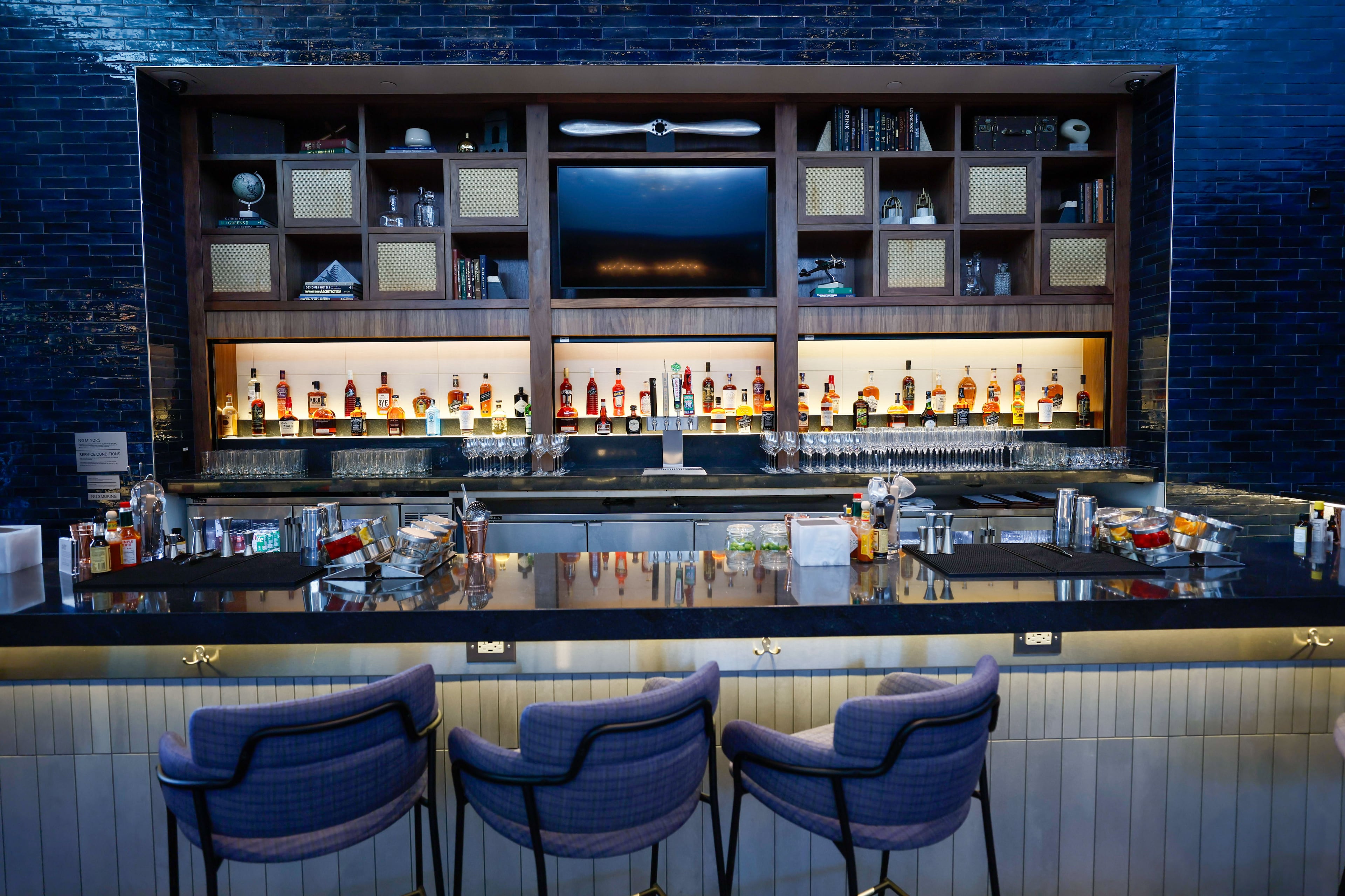 The Centurion Lounge at Hartsfield-Jackson International Airport has a regular bar in the dining area and a separate whiskey bar.
Miguel Martinez /miguel.martinezjimenez@ajc.com