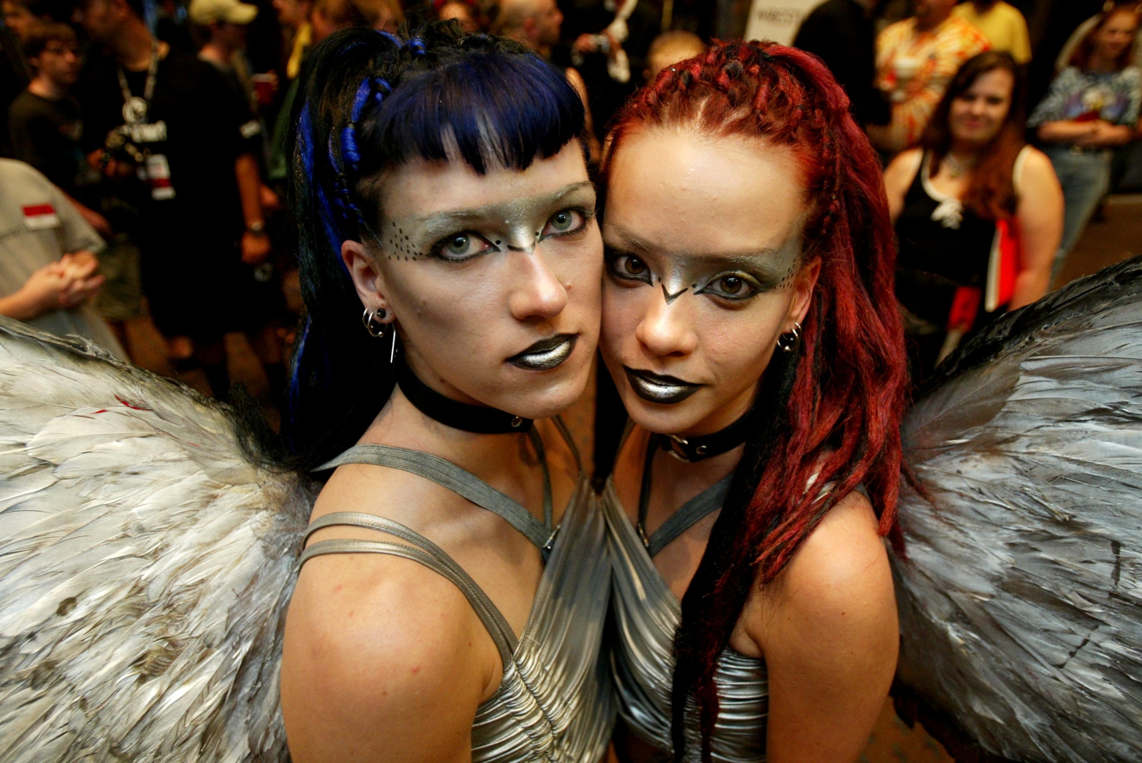 (From left) Beth Allen and Jessica Lackey, dancers in the group Cruxshadows pose for a photo at Dragon Con on Friday, Aug, 29, 2003. (Jenni Girtman/AJC)