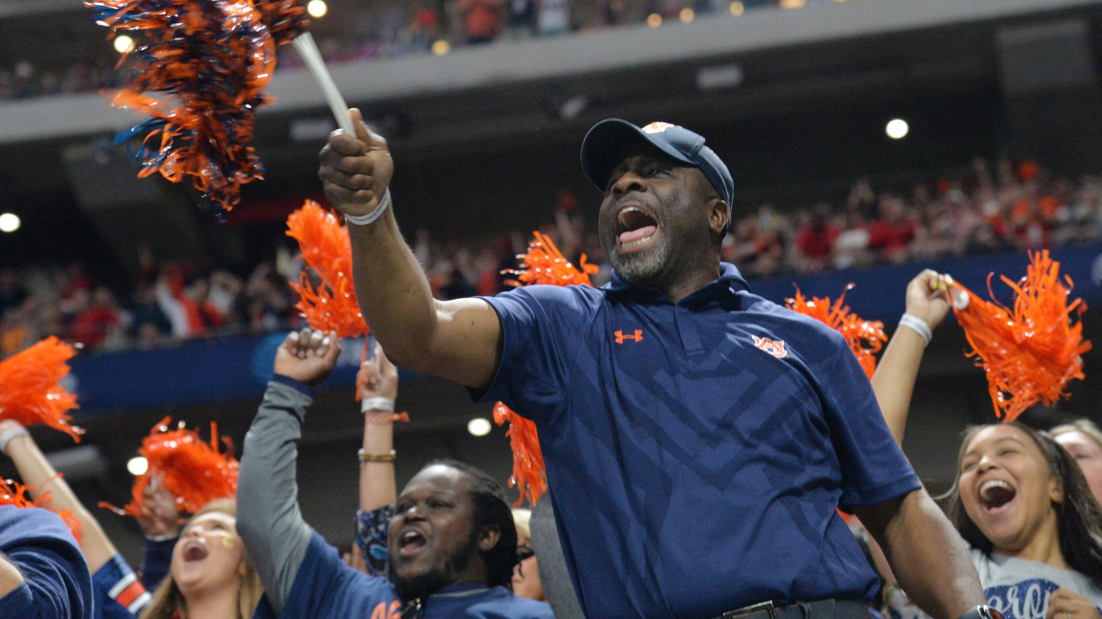 Auburn Tigers fans cheer during first half of the SEC Championship game on Dec. 2.