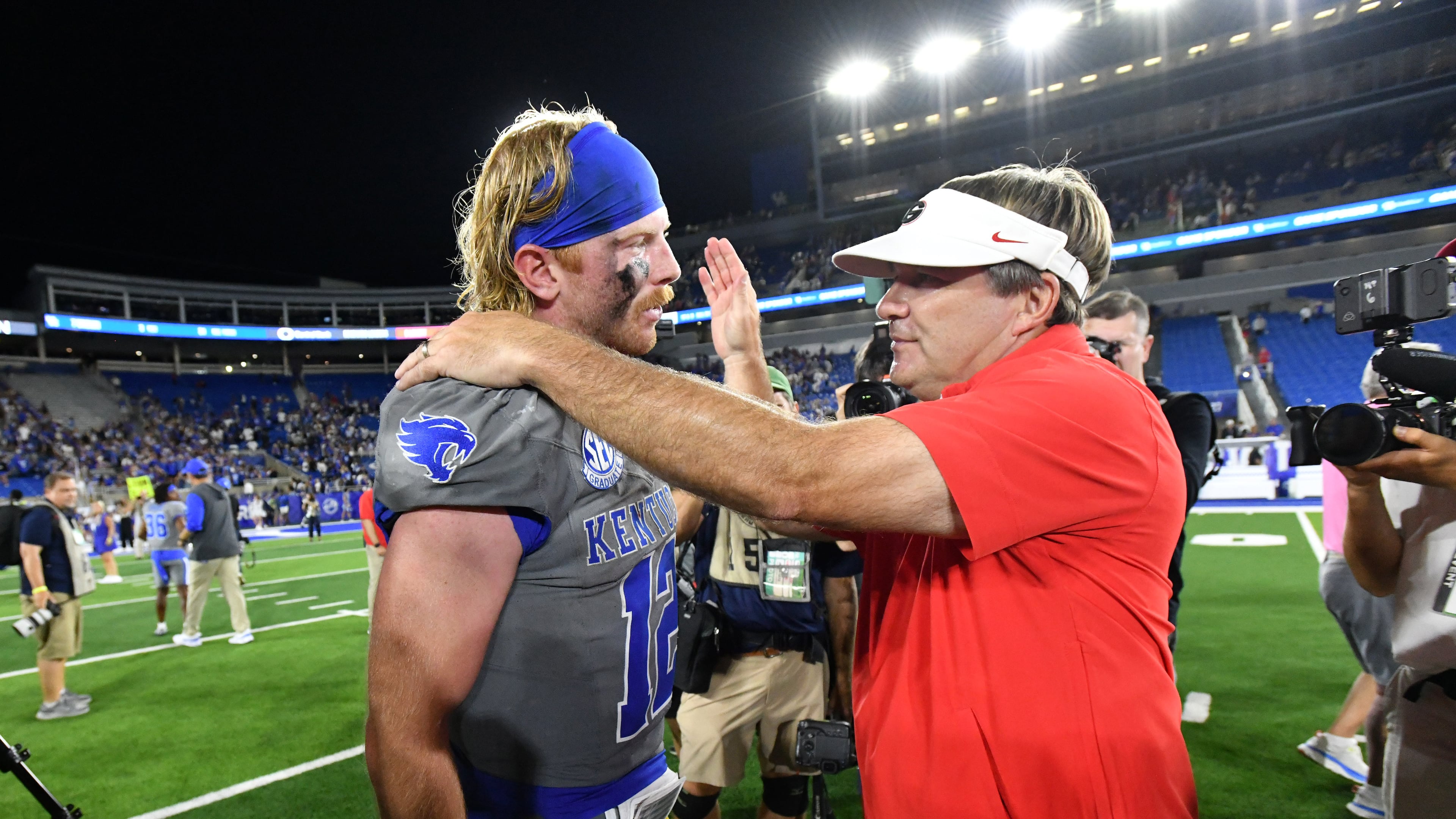 Georgia head coach Kirby Smart and Kentucky quarterback Brock Vandagriff greet each other after Georgia beat Kentucky during an NCAA football game at Kroger Field, Saturday, Sept. 14, 2024, in Lexington, Kentucky. (Hyosub Shin/AJC)