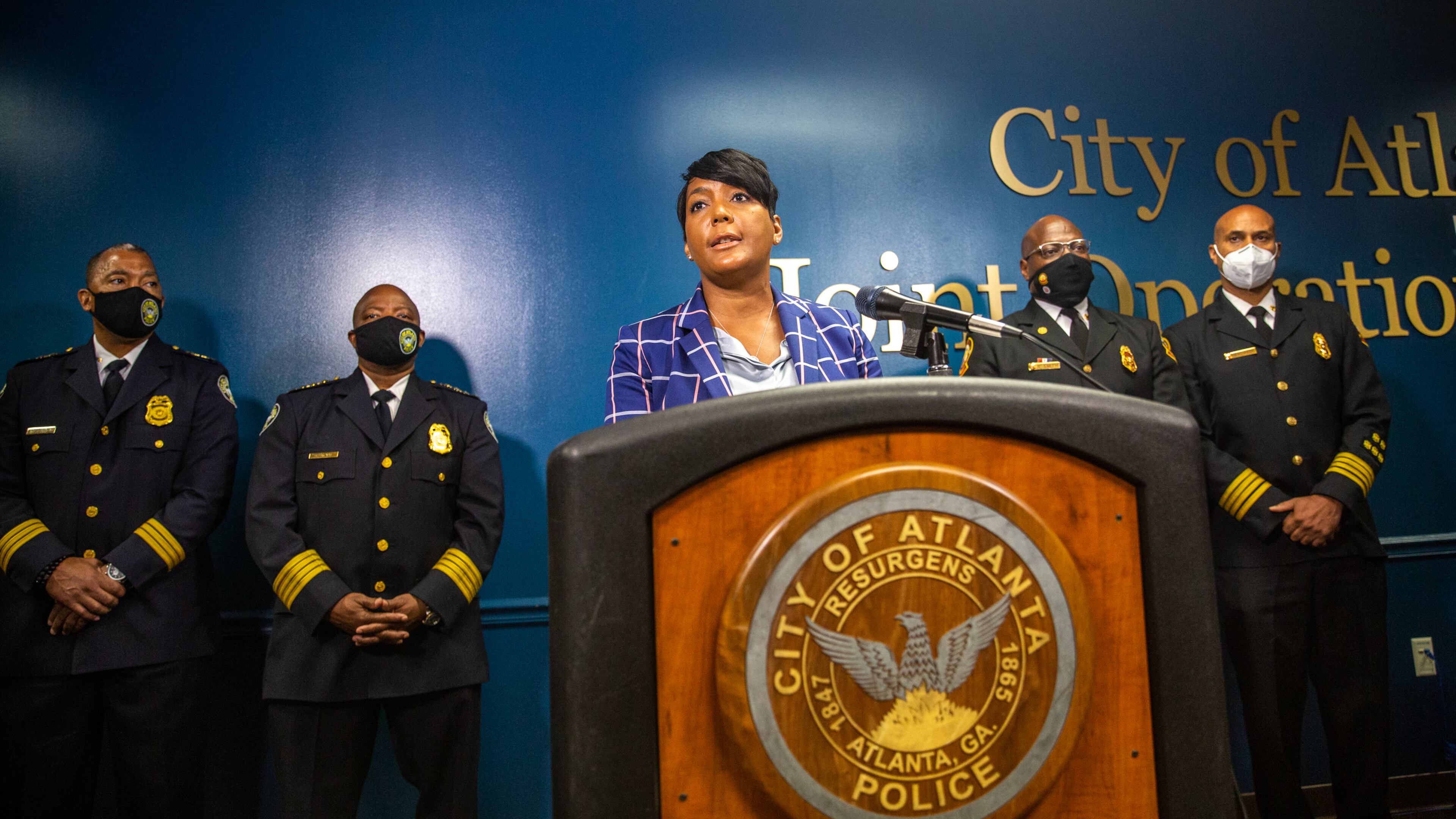 After the approval vote of the Public Safety Training Center this week, Mayor Mayor Keisha Lance Bottoms, Atlanta Police Chief Rodney Bryant, Chief Rod Smith of the Atlanta Fire Rescue Department and Dave Wilkinson of the Atlanta Police Foundation address questions about the facility, it's location and the concerns of the community Thursday, Sept 9, 2021. (Jenni Girtman for The Atlanta Journal-Constitution)