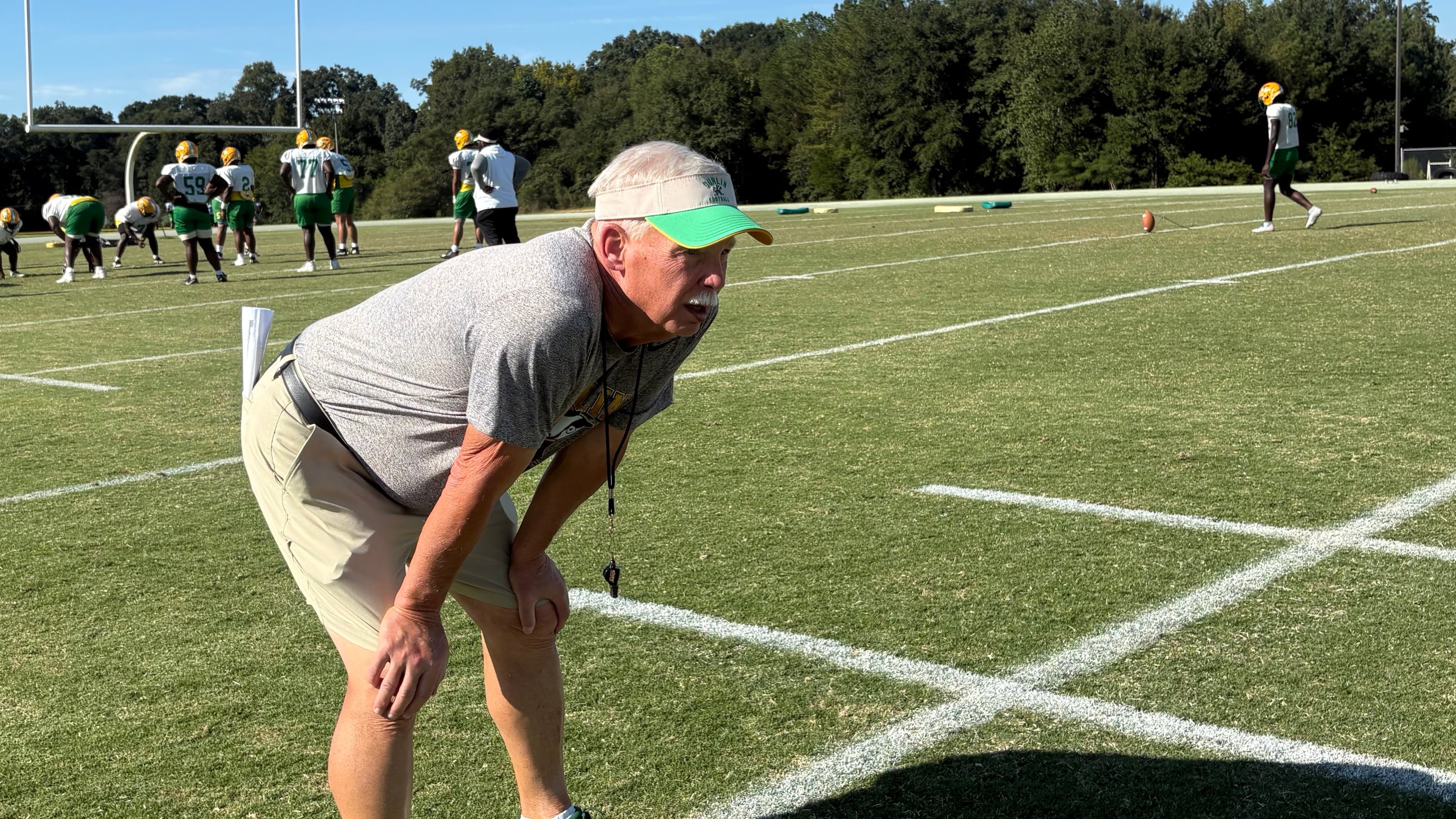 Roger Holmes watches his Wing-T offense work through plays catered for its next game. Holmes' team is 5-1 and ranked No. 5 in state in Class 2A. (Jack Leo/AJC)