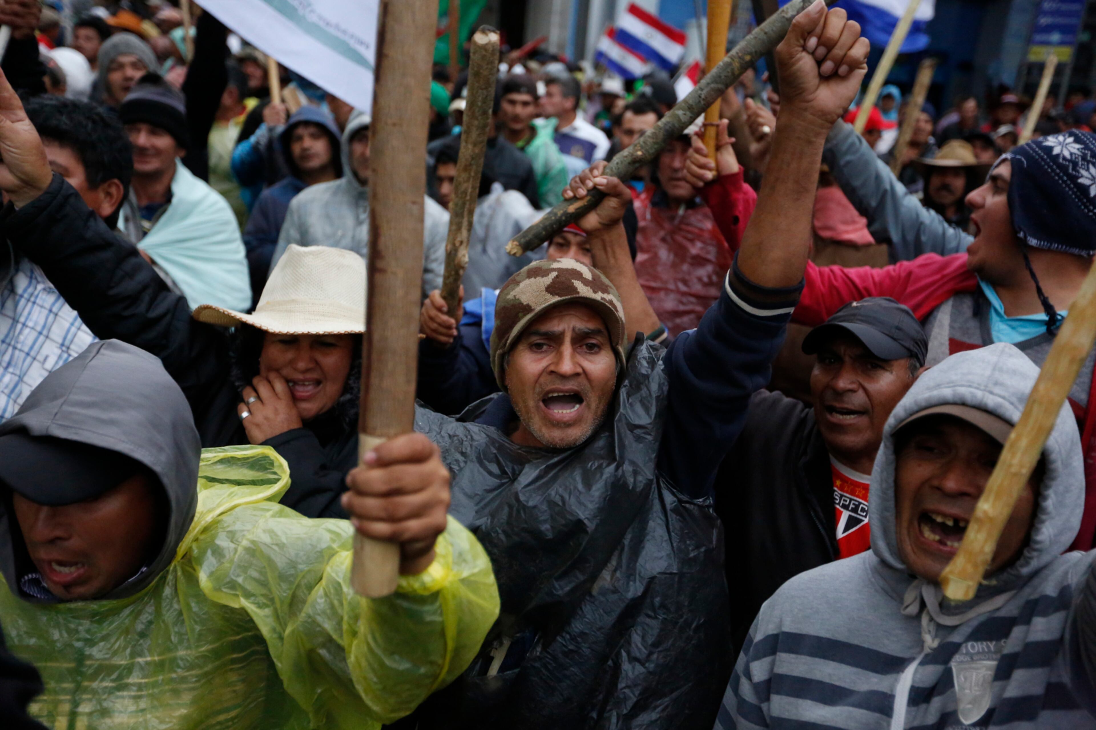 Farmers from northern Paraguay protest in downtown Asuncion, Paraguay, Wednesday, Aug. 2, 2017. Farmers have been camping out in protest since July 10, demanding the government forgive debt they accumulated when the harvest failed due to lack of rain and intense cold. (AP Photo/Jorge Saenz)