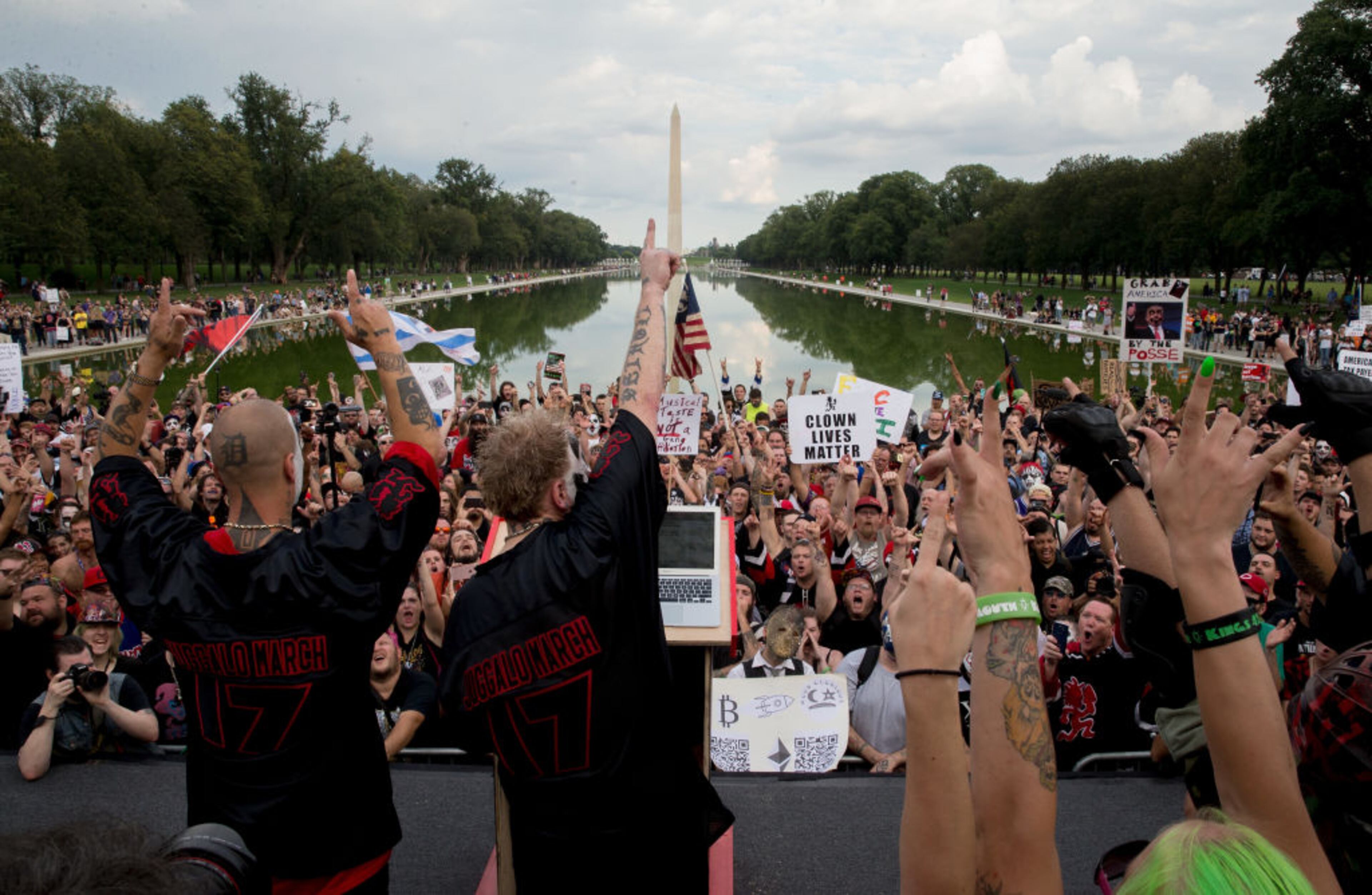 WASHINGTON, DC - SEPTEMBER 16: (L) Shaggy 2 Dope and (R) Violent J of Insane Clown Posse speak before the Juggalo March takes off from the Lincoln Memorial on the National Mall, on September 16, 2017 in Washington, DC. Fans of the band Insane Clown Posse. known as Juggalos, are protesting their identification as gang by the FBI in a 2011 National Gang Threat Assessment, (Photo by Tasos Katopodis/Getty Images)