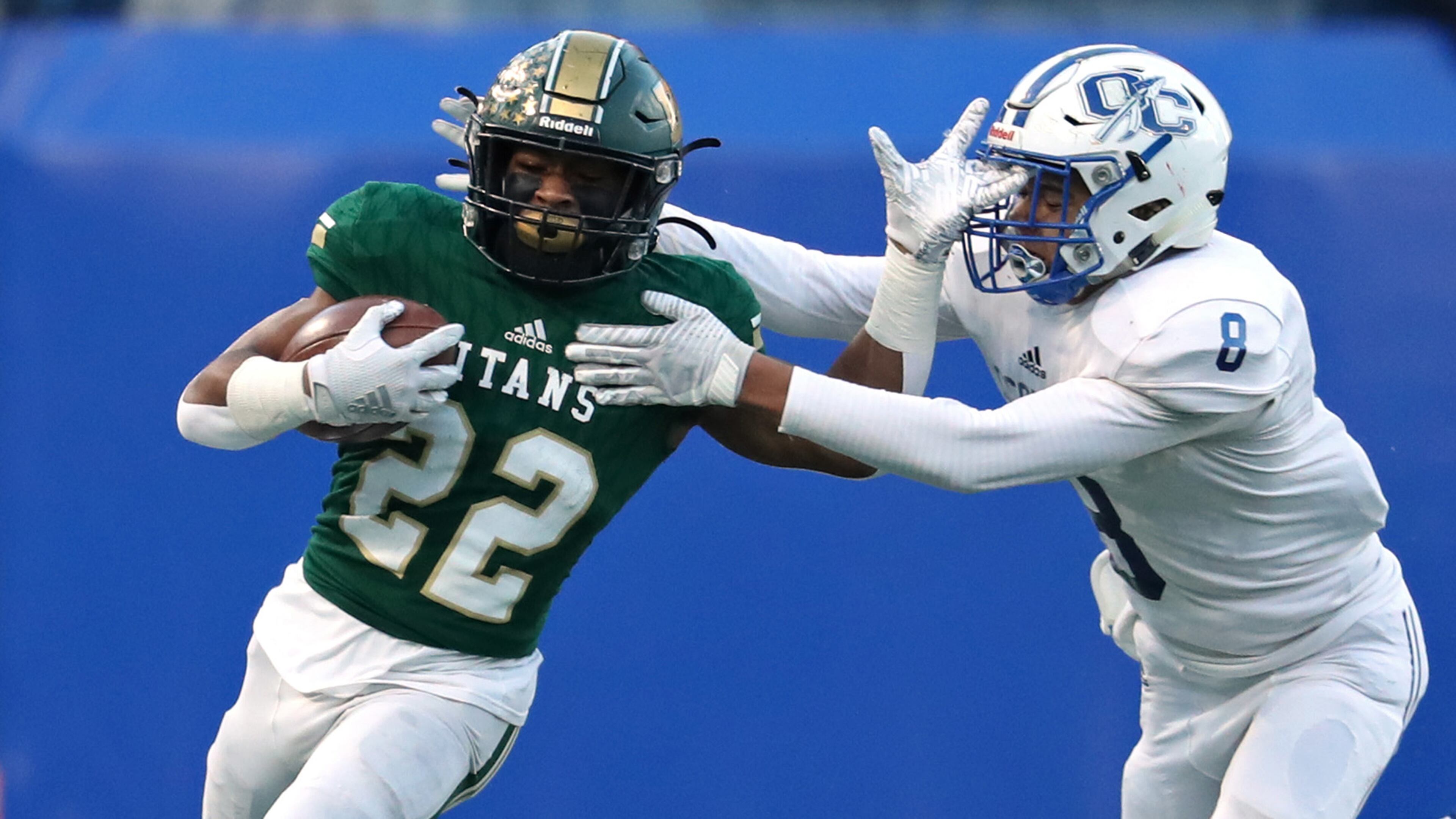 Justice Haynes (22), shown during Blessed Trinity's victory over Oconee County in the 2019 Class 4A championship game, ran for 250 yards and four touchdowns in a 54-32 win over Kell last week. (Jason Getz/For the AJC)