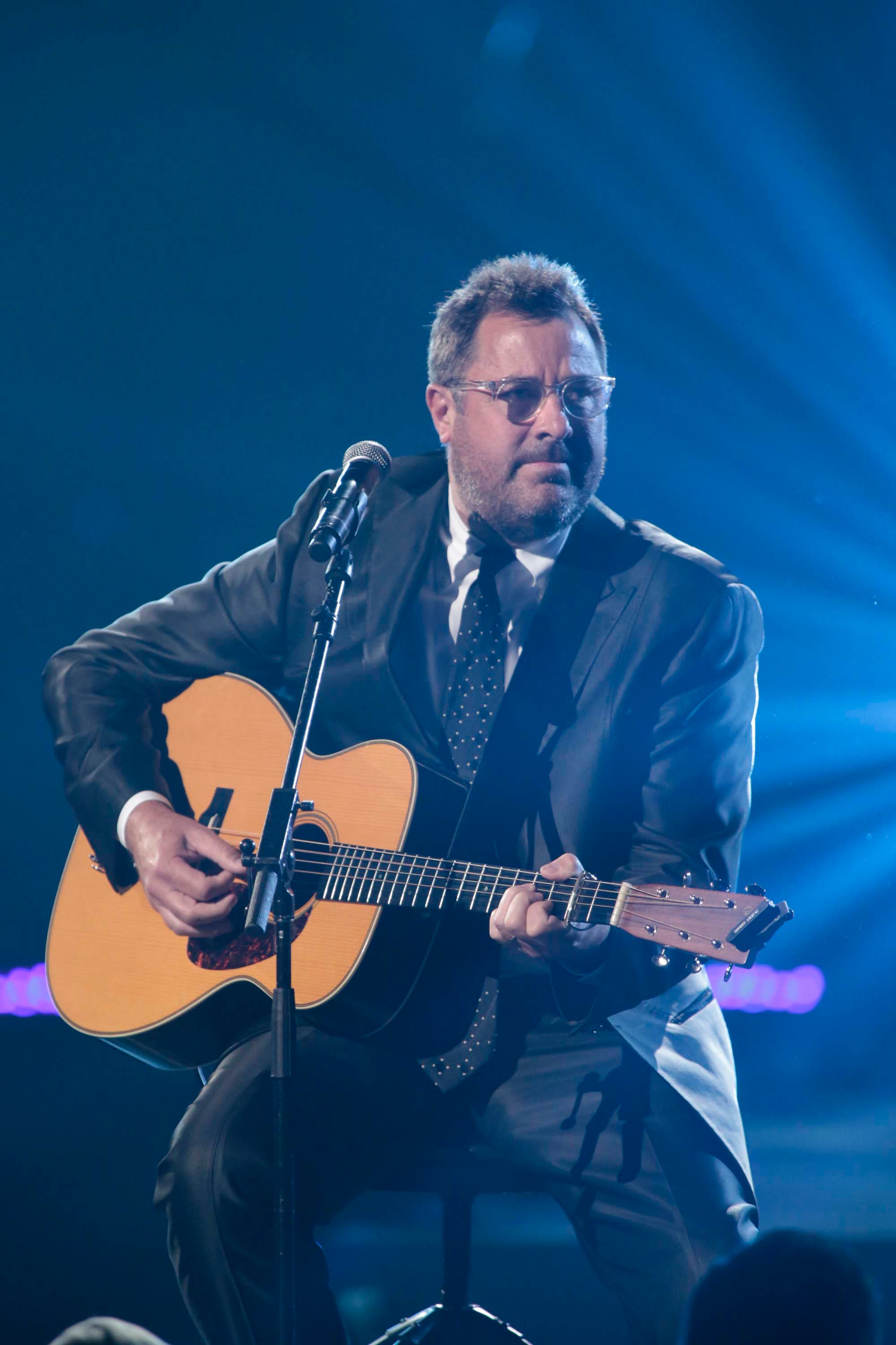 Vince Gill during the Healing in the Heartland: Relief Benefit Concert at the Chesapeake Energy Arena in Oklahoma City, Okla., Wednesday, May 29,2013. Funds raised by the benefit will go to the United Way of Central Oklahoma, for recovery efforts for those affected by the May 20 tornado. (AP Photo/NBC, Brett Deering)