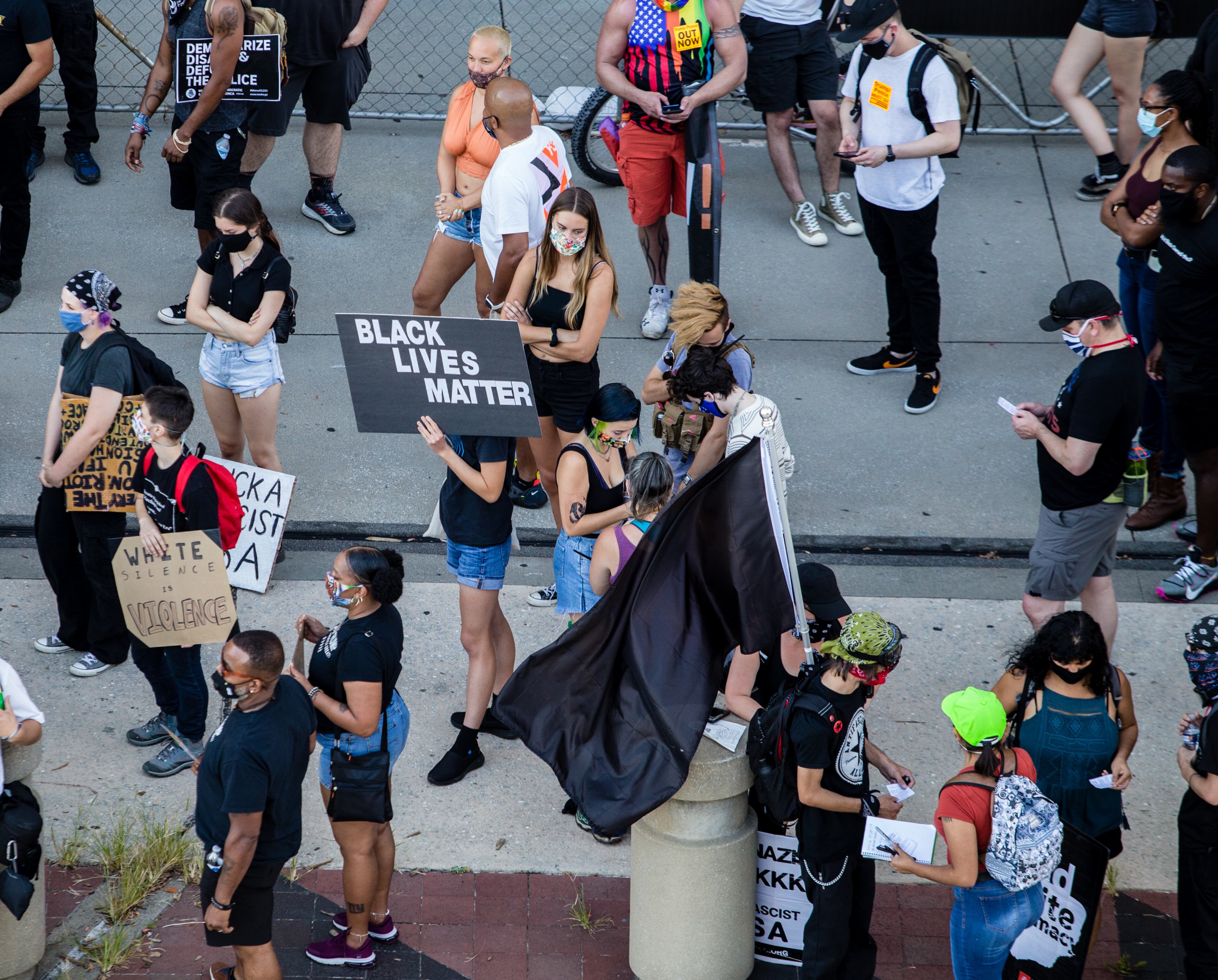 Protesters gather at the CNN Center on Saturday, September 5, 2020. The protest started at Ebenezer Baptist Church as a political gathering and joined a Black Lives Matter protest at CNN Center with a heavy police escort along the way. (Jenni Girtman for The Atlanta Journal-Constitution)