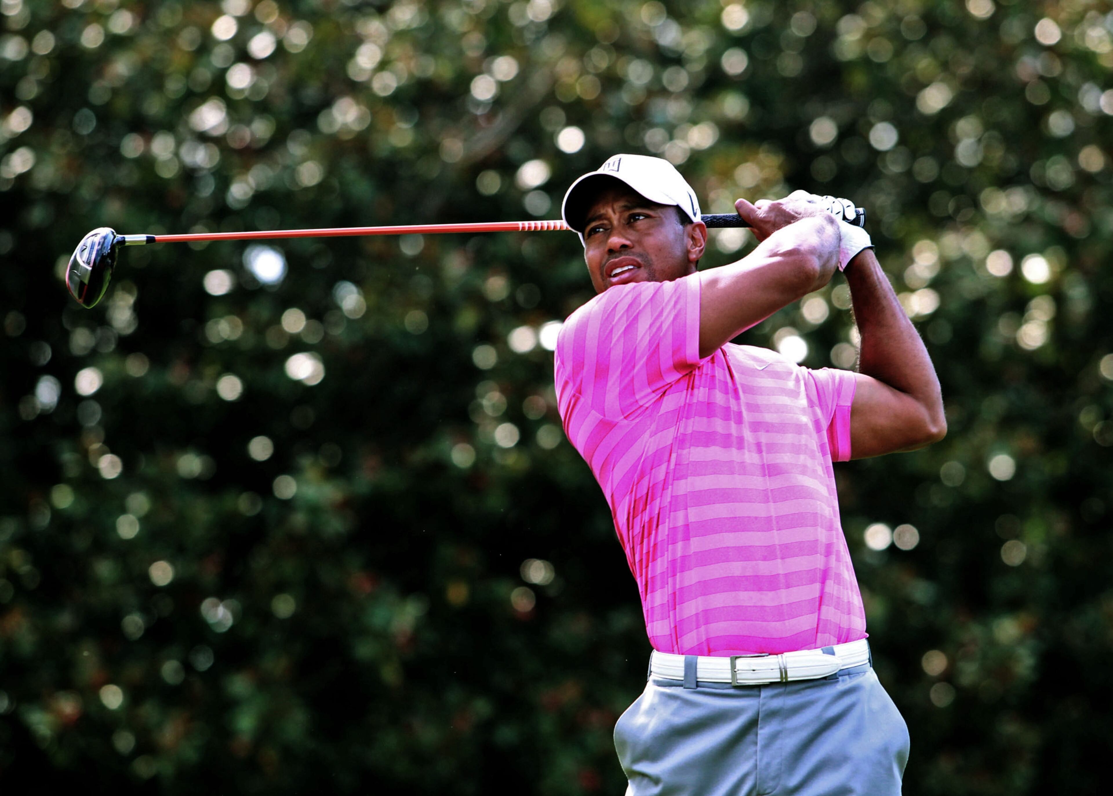 Tiger Woods follows through on his No. 5 tee shot shot during Friday's round 2 of the Tour Championship.