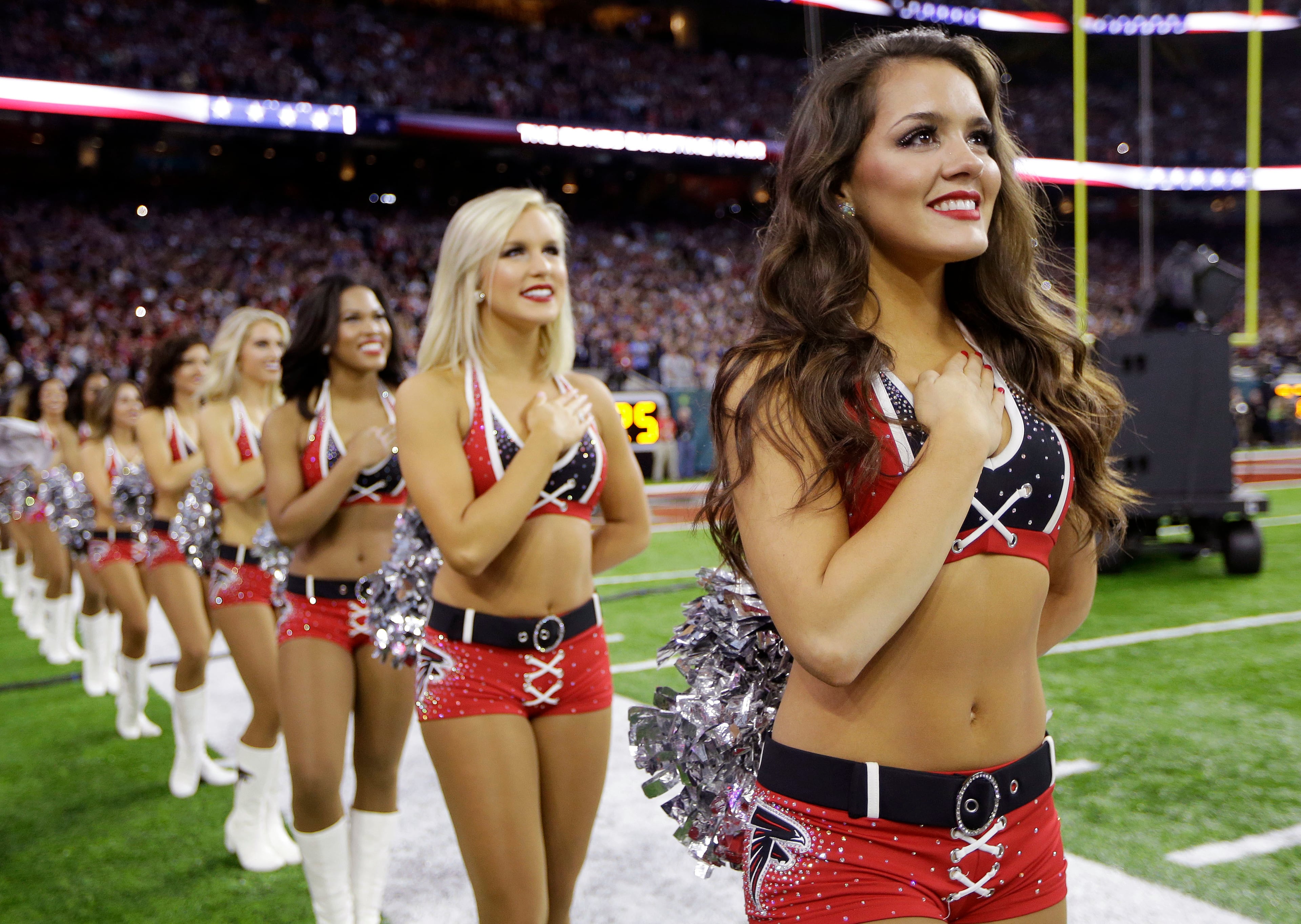 Atlanta Falcons cheerleaders listen during the National Anthem before the NFL Super Bowl 51 football game between the Atlanta Falcons and the New England Patriots, Sunday, Feb. 5, 2017, in Houston. (AP Photo/Mark Humphrey)