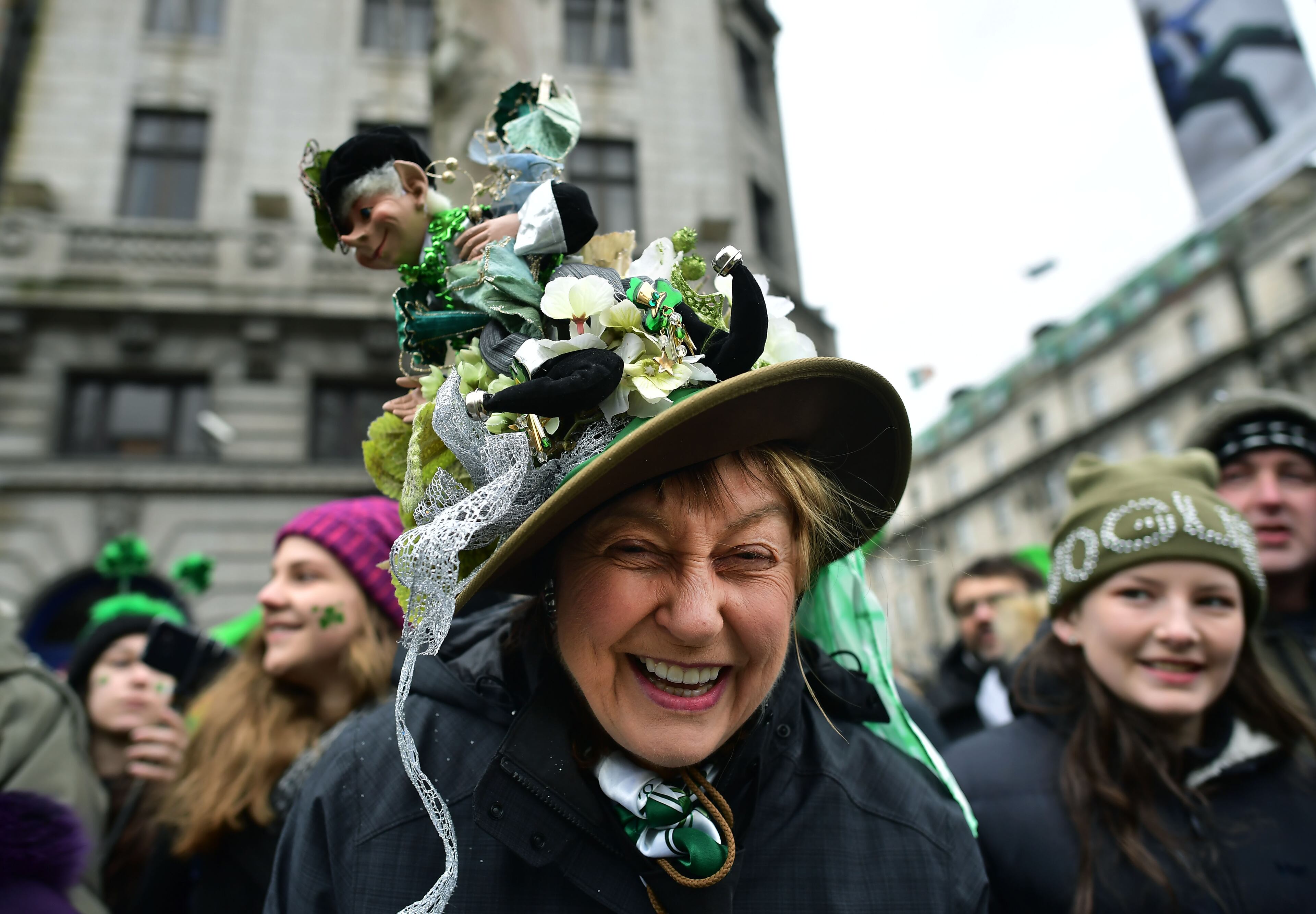 DUBLIN, IRELAND - MARCH 17: A spectator shows off her hat as the annual Saint Patrick's day parade takes place on March 17, 2018 in Dublin, Ireland. Dublin hosts the largest Saint Patrick's day parade in the world with a route spanning 2.5 km. The Irish annals for the fifth century date Patrick's arrival in Ireland in the year 432 with the patron saint of Ireland's remains believed to be buried at Down Cathedral in County Down. (Photo by Charles McQuillan/Getty Images)