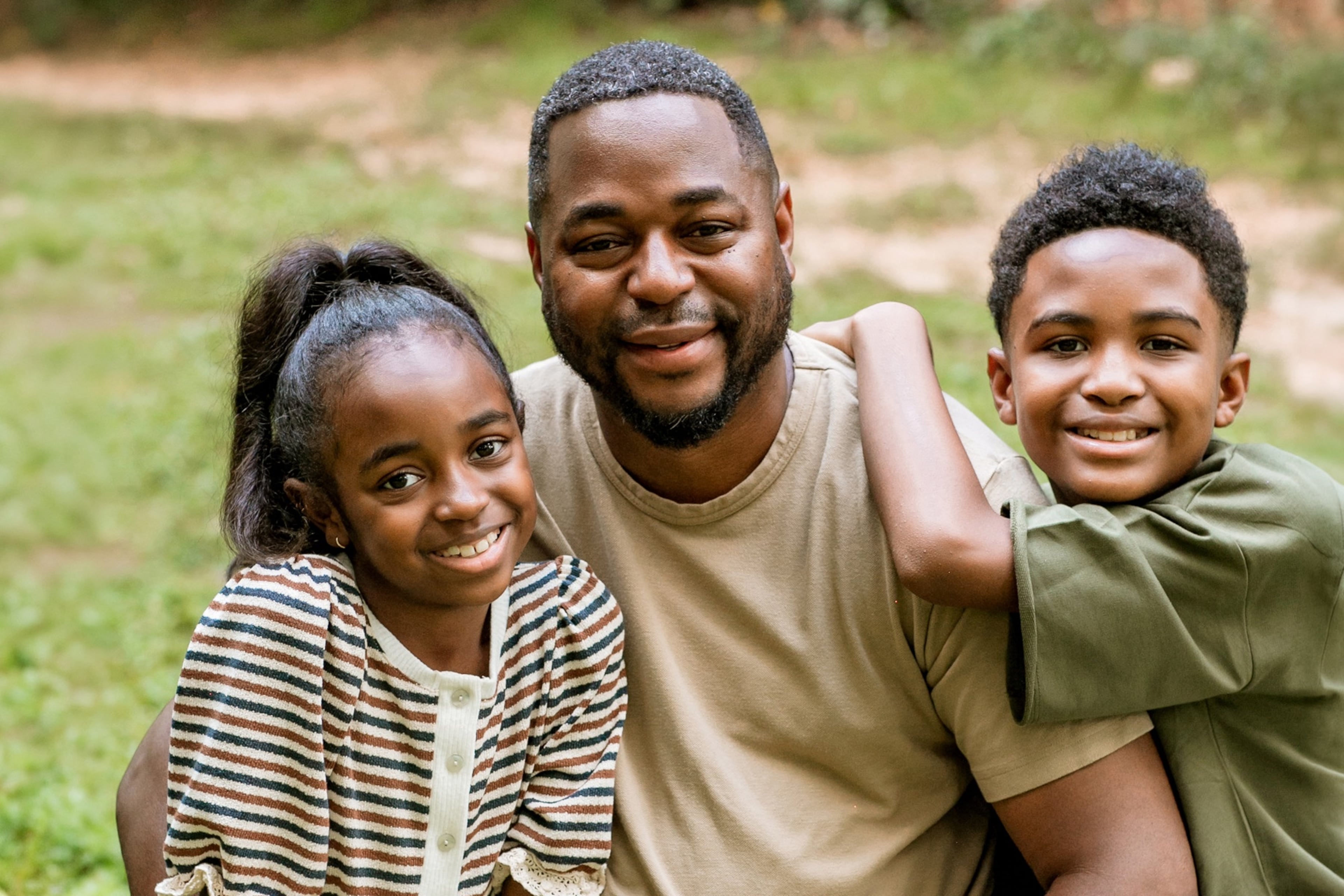 Mose James IV — with his daughter Jurnee and son Mose James V — said he and his dad had a business-style, handshake-heavy relationship. “I kiss and hug on my kids every single day,” he says. (Photo by Christy Gillam, Paperily Photography)