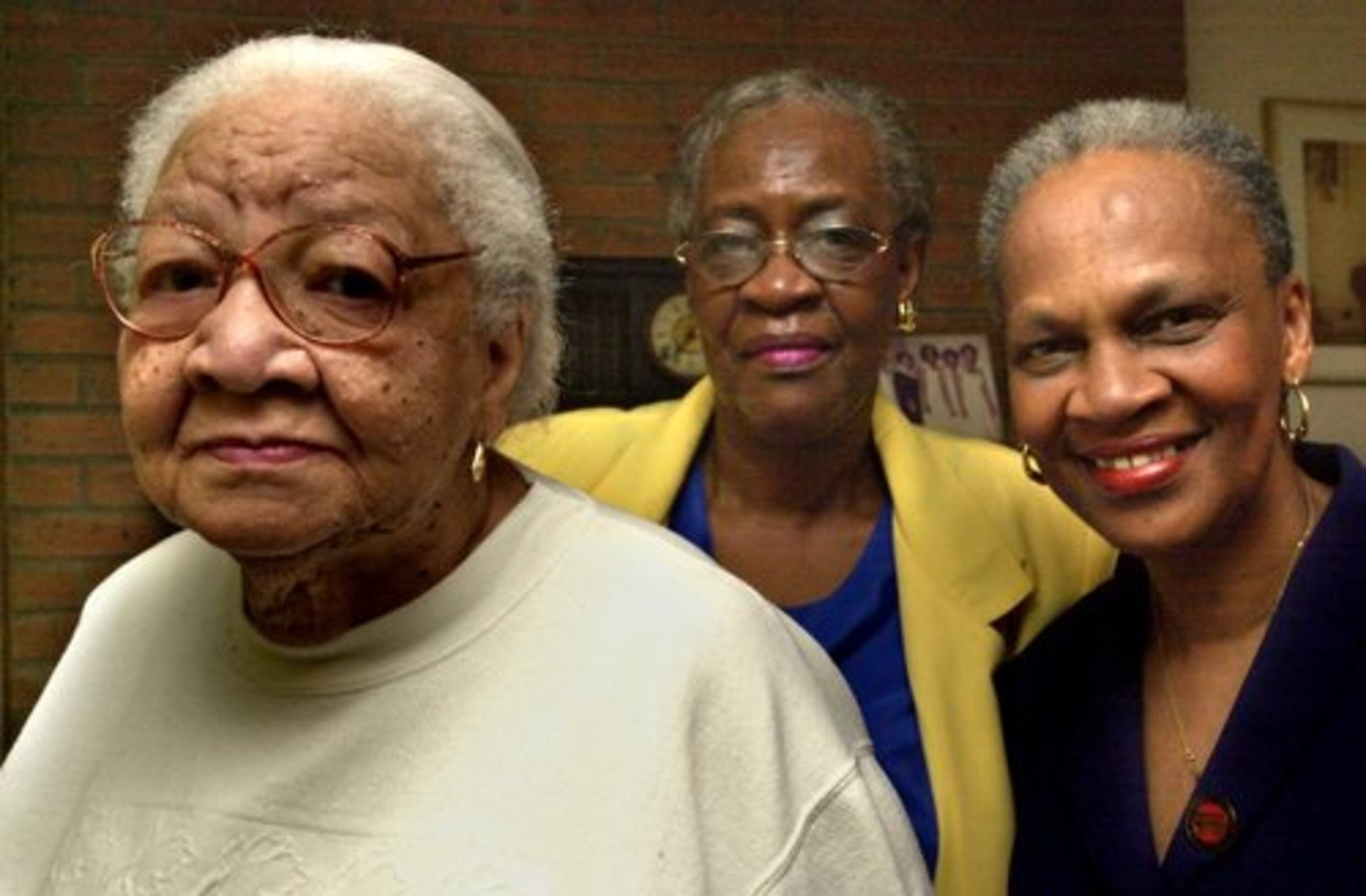 Marcia Glenn Hunter's mother, Maggie Woods (left), was the first black woman on the Lithonia City Council. Her sister Barbara Lester became a city councilwoman. Marcia Glenn is at right.