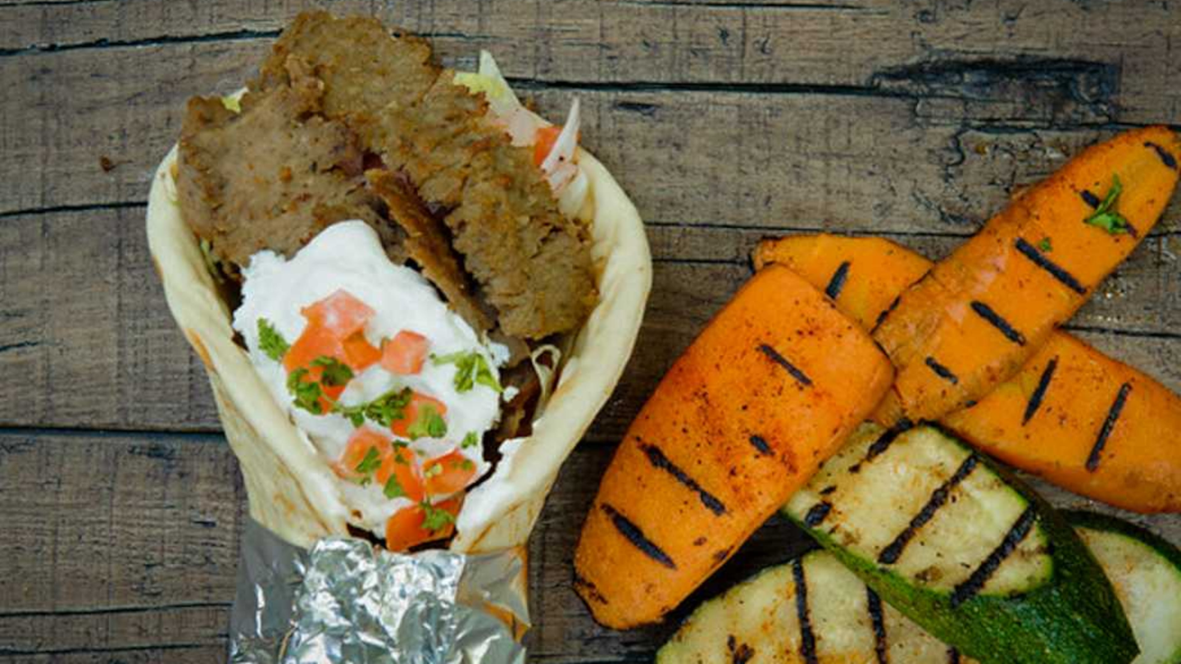 This is the gyro with grilled vegetables served at Pita Mediterranean Street Food. You can get this (and a drink) for free when the franchise opens a store in West Cobb on Friday.